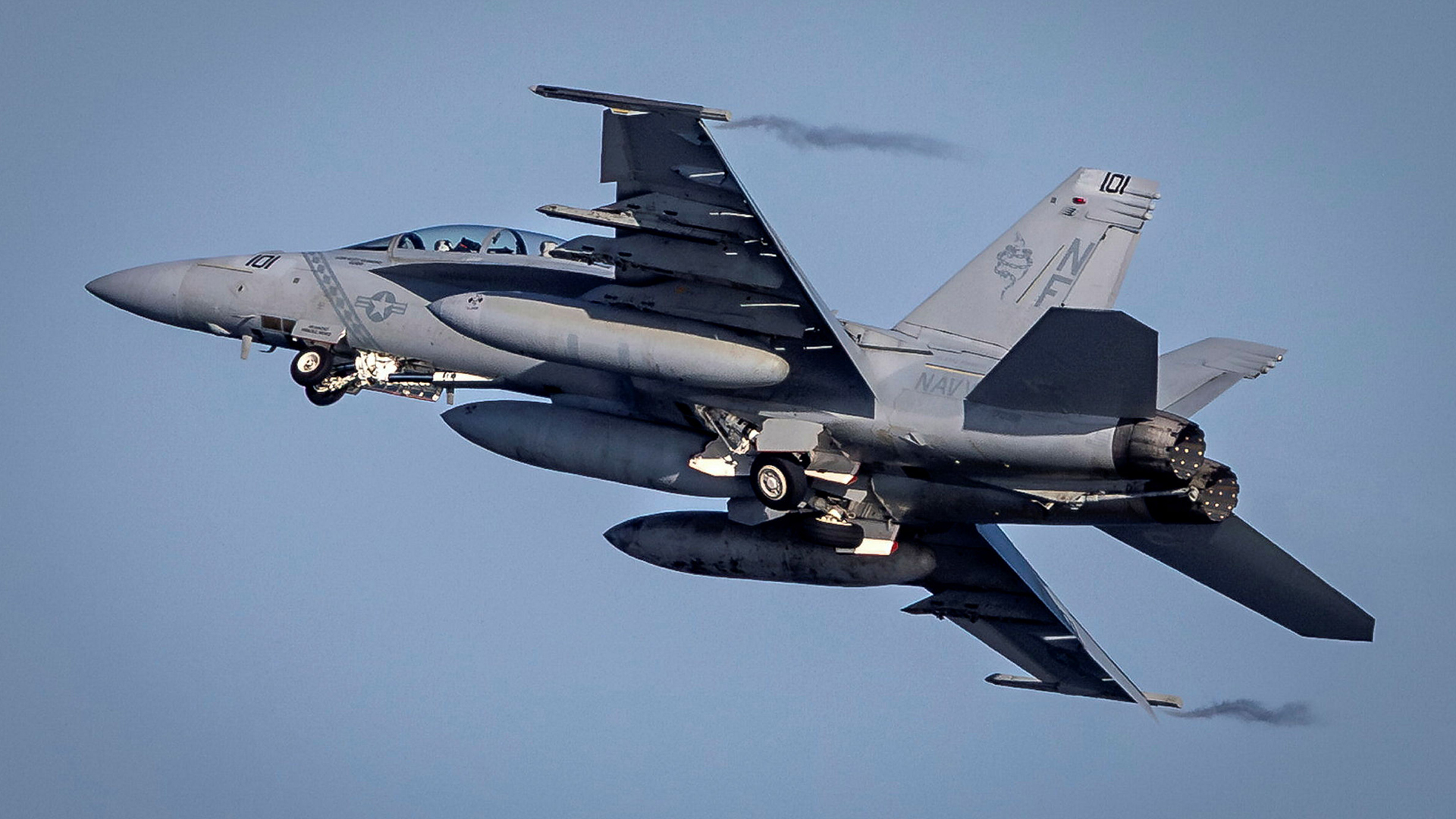 This US Navy F/A-18F - the current two-seat variant of the Super Hornet - goes wheels-up after a successful launch (Picture: MOD)