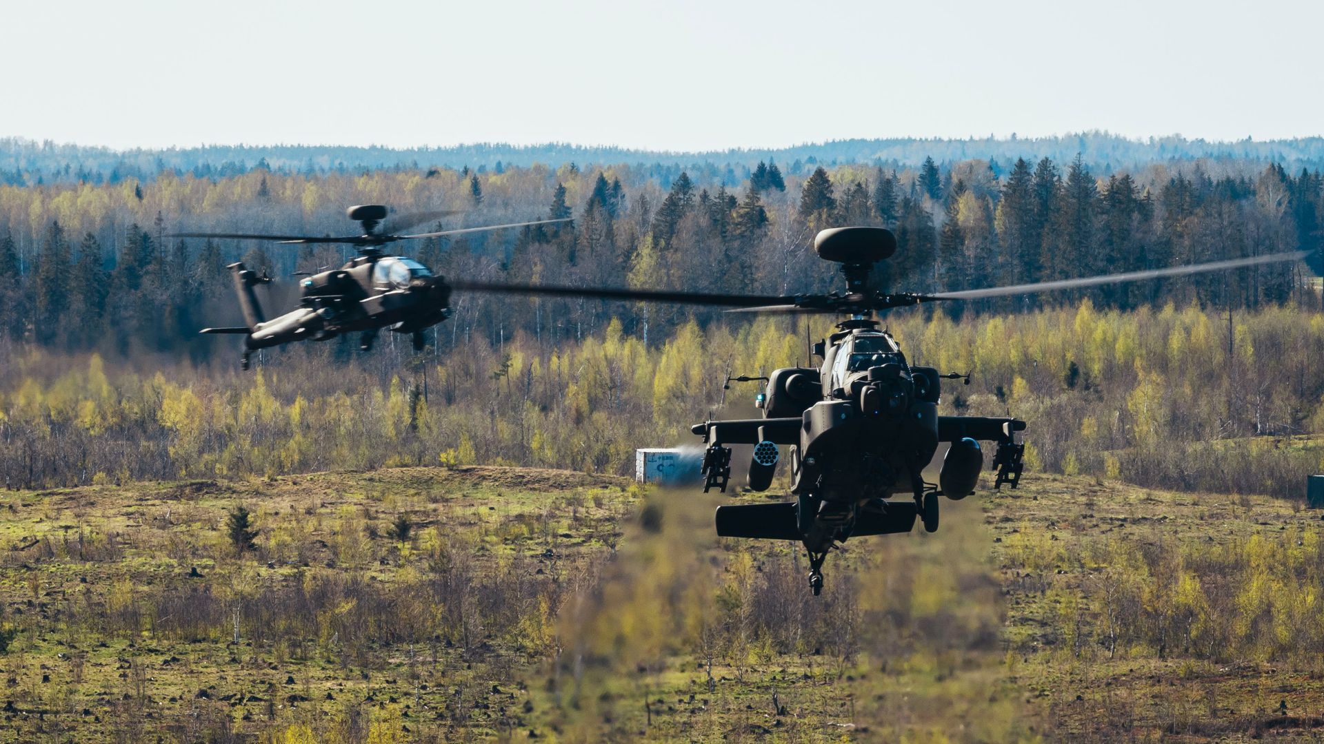 Two Apache AH-64E fly low during Exercise Swift Response in Estonia (Picture: MOD)