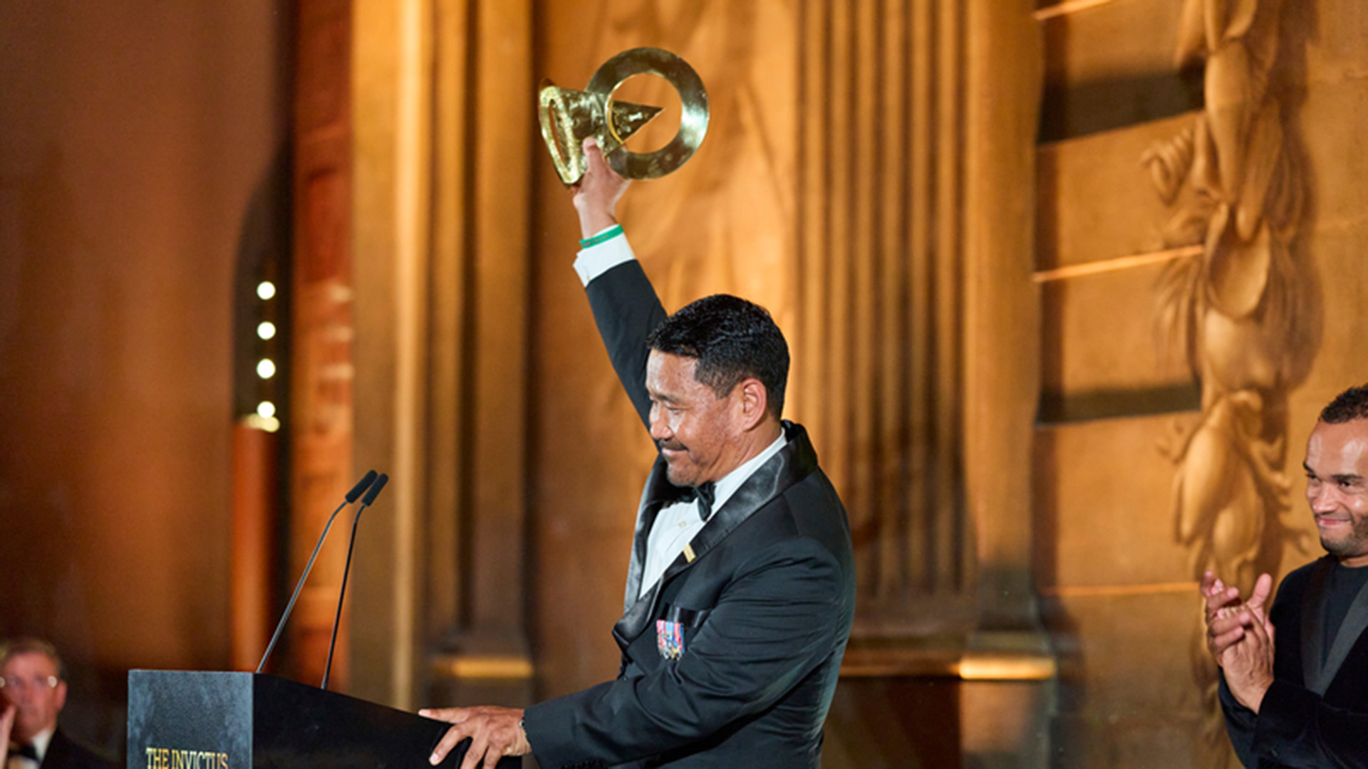 Hari Budha Magar lifts his Resilience Award above his head (Picture: Invictus Games Foundation)