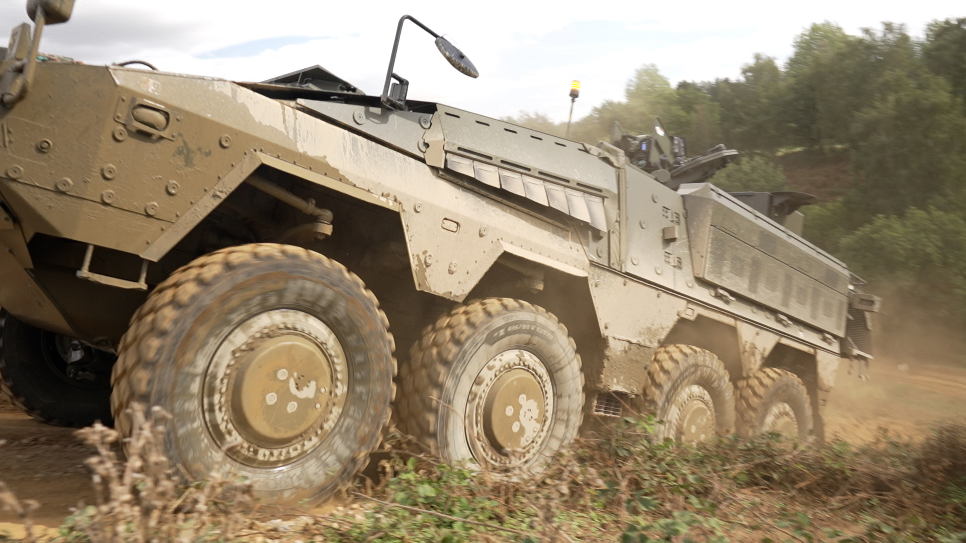 The Army's new Boxer mechanised infantry vehicle shows off its impressive off-road capability at the Defence Vehicle Dynamics exhibition at Millbrook (Picture: BFBS)