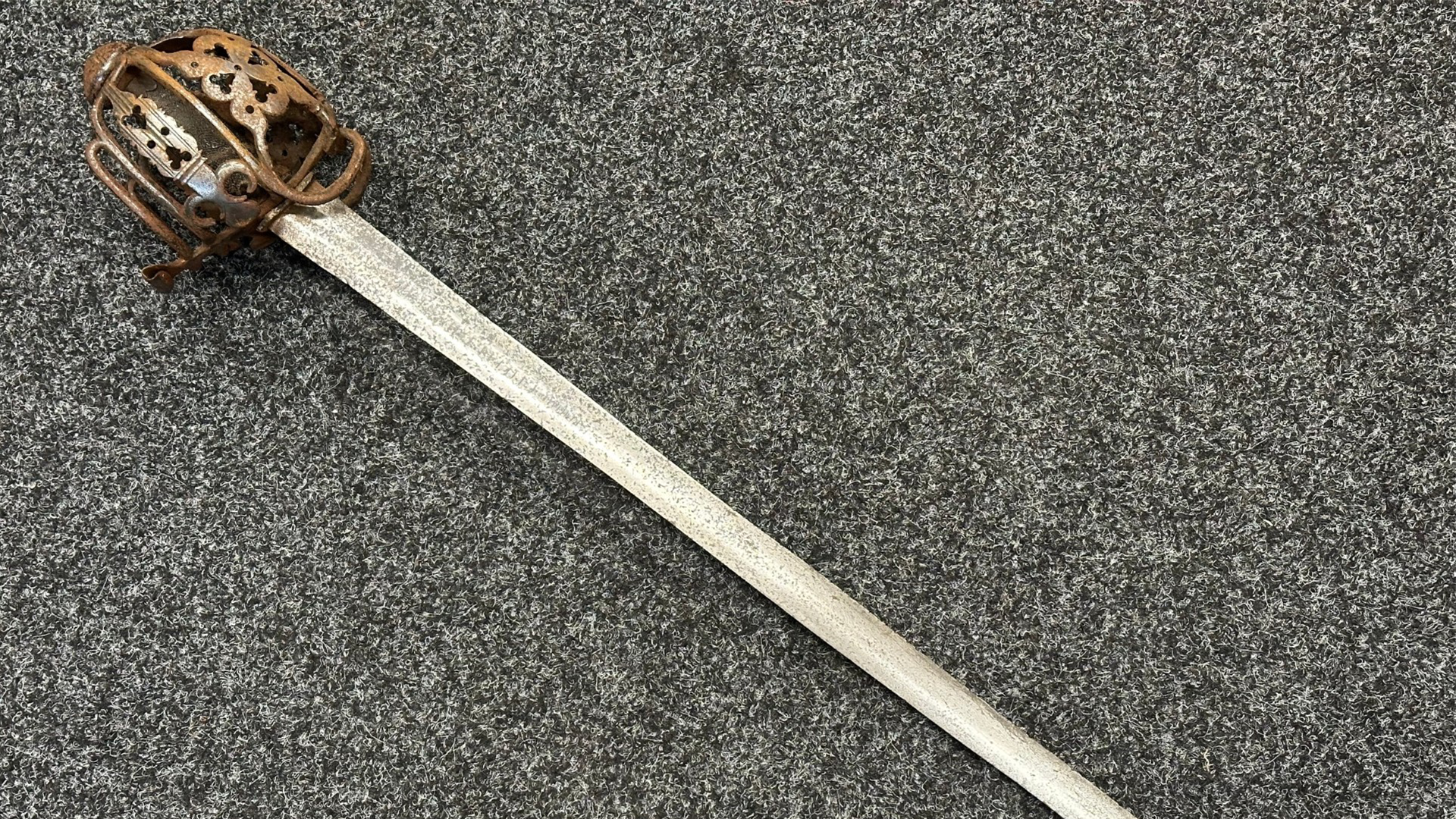 18122025 mid 18th Century Scottish Basket Hilt Sword CREDIT Bamfords Auctioneers and Valuers