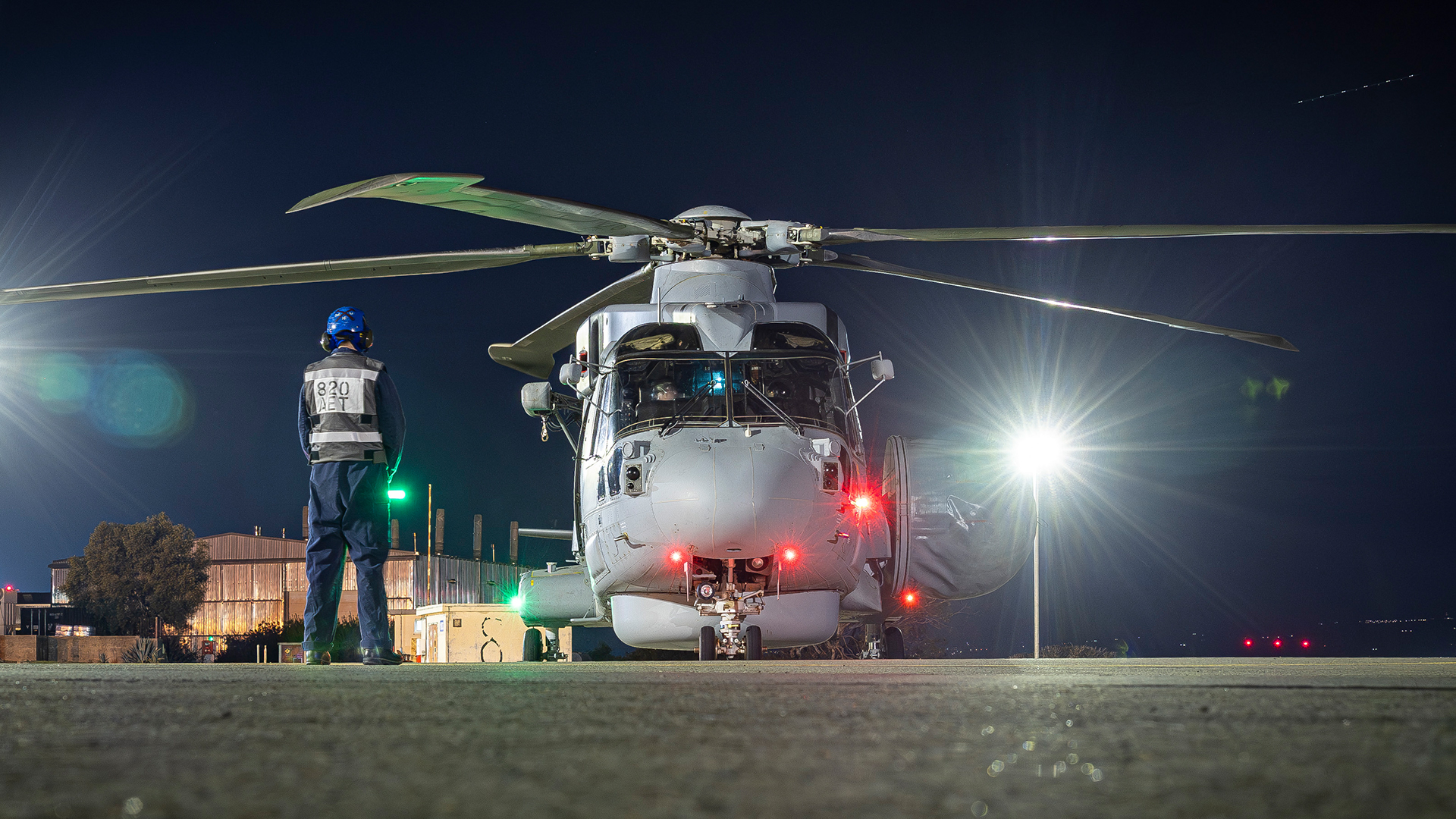 A specialist Royal Navy Merlin Mk2 Crowsnest helicopter prepares to take off for a night sortie from RAF Akrotiri 