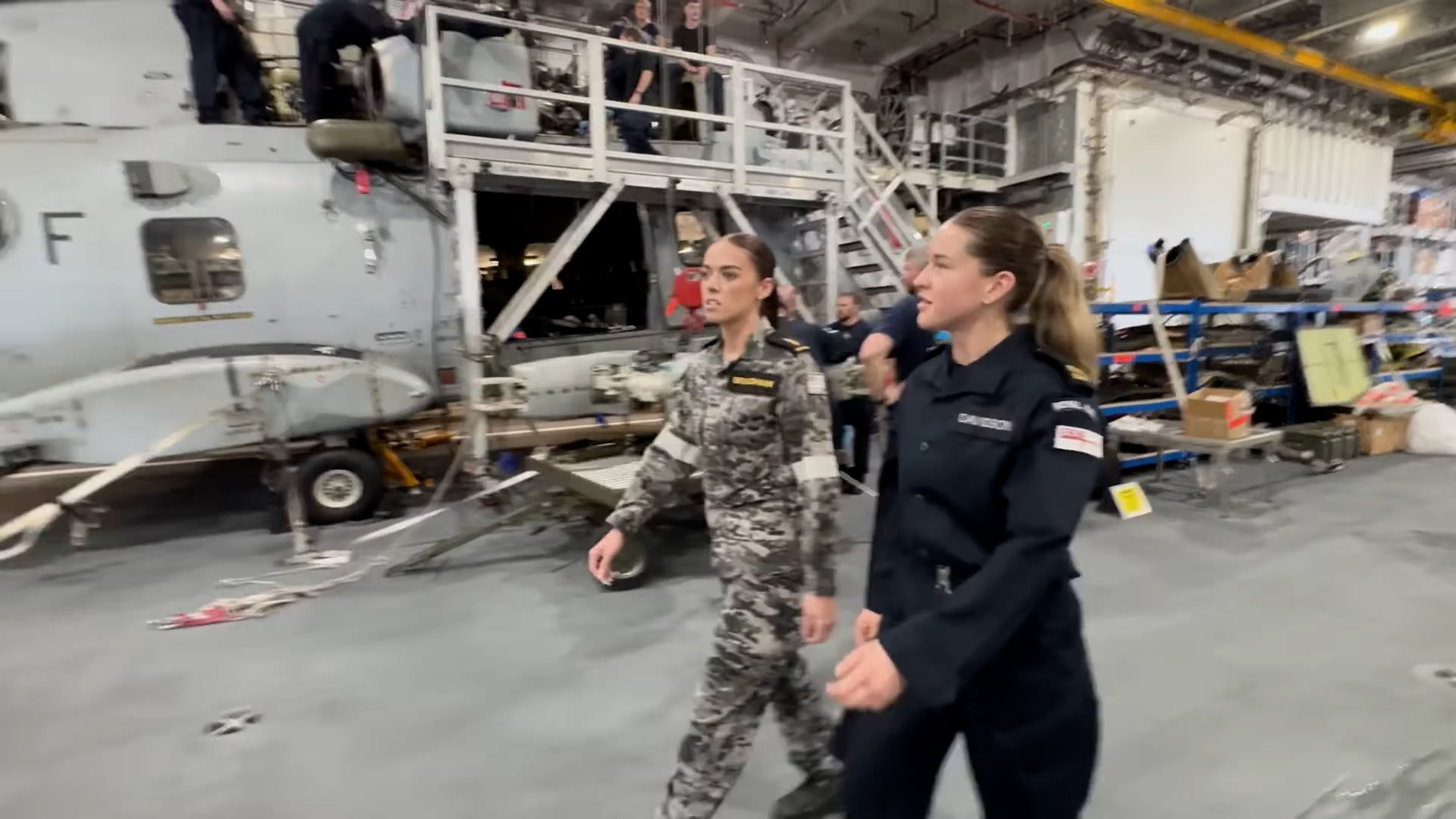 AB Bradshaw was take to the hangar where she saw the Merlins and F-35s kept below decks