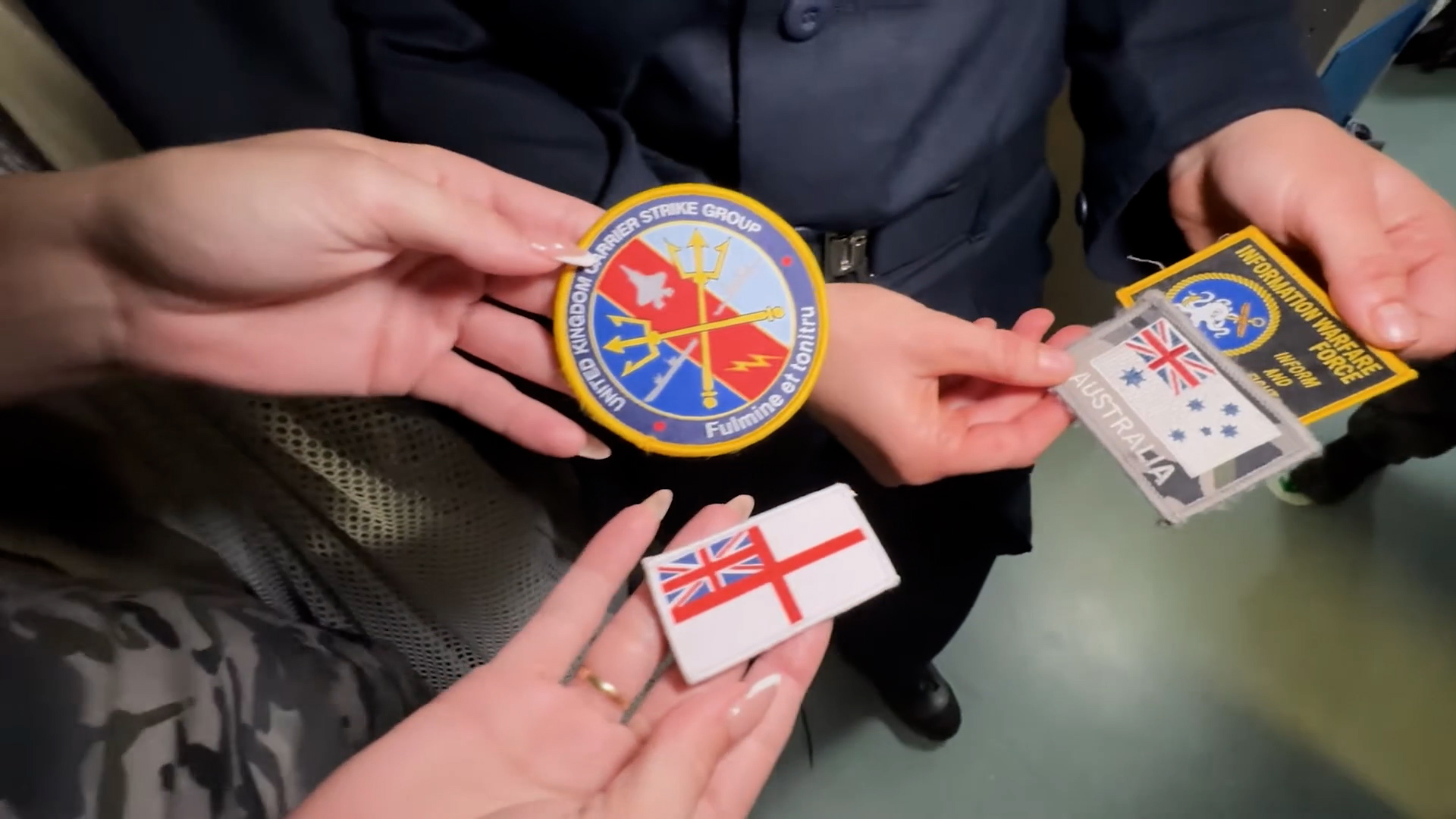 Swapping patches is a common practice and is a sign of unity and friendship