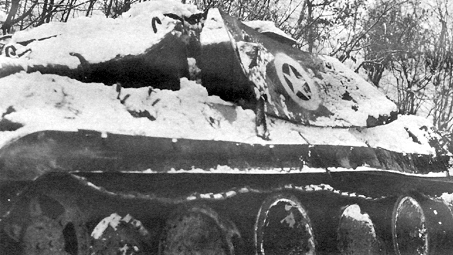 This Panther was adapted to resemble a US M10 tank destroyer - it wouldn't work up close, but could cause a fatal delay if a US tank gunner laid his sights on the vehicle and saw the shape and Allied white star