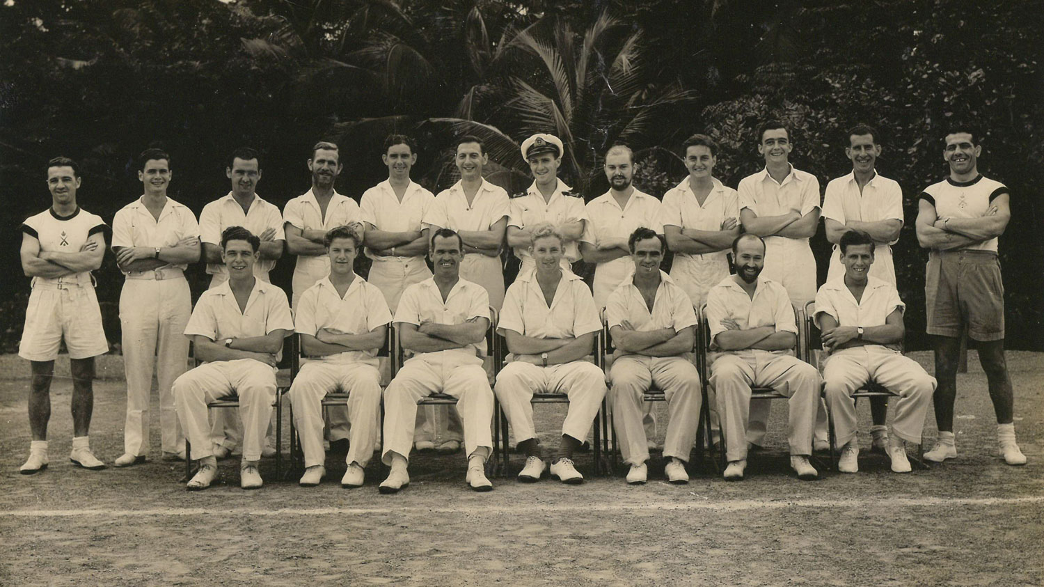 1946 HMS Gould's cricket team pictured in 1946. CPO Thomas Topley is third from left on the front row CREDIT Topley family