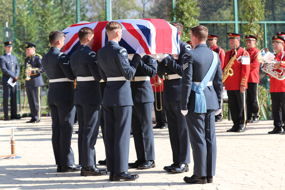 The Queen’s Colour Squadron prepare to raise the coffin Credit MOD