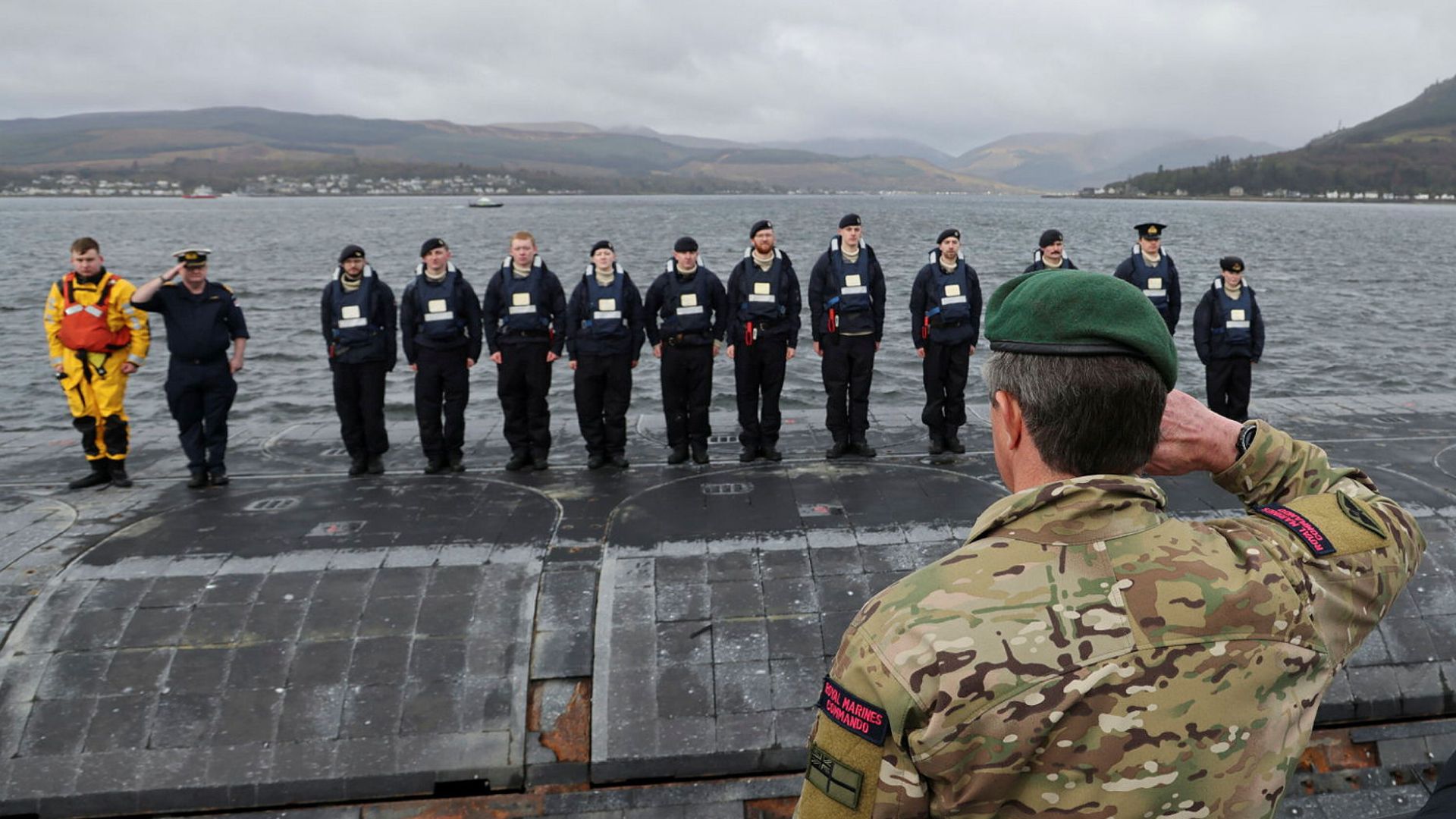 Sir Gwyn salutes the casing party and they return from their record breaking deployment