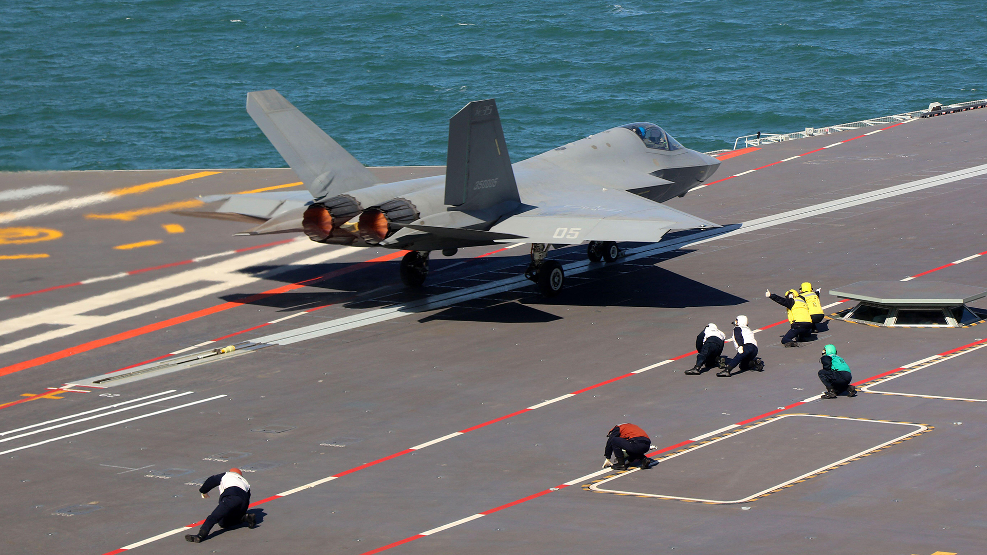 Unlike Mr Trump, the Chinese navy is more than happy with its electromagnetic launch system, with this J-35 taking off from the Fujian (Picture: Alamy)