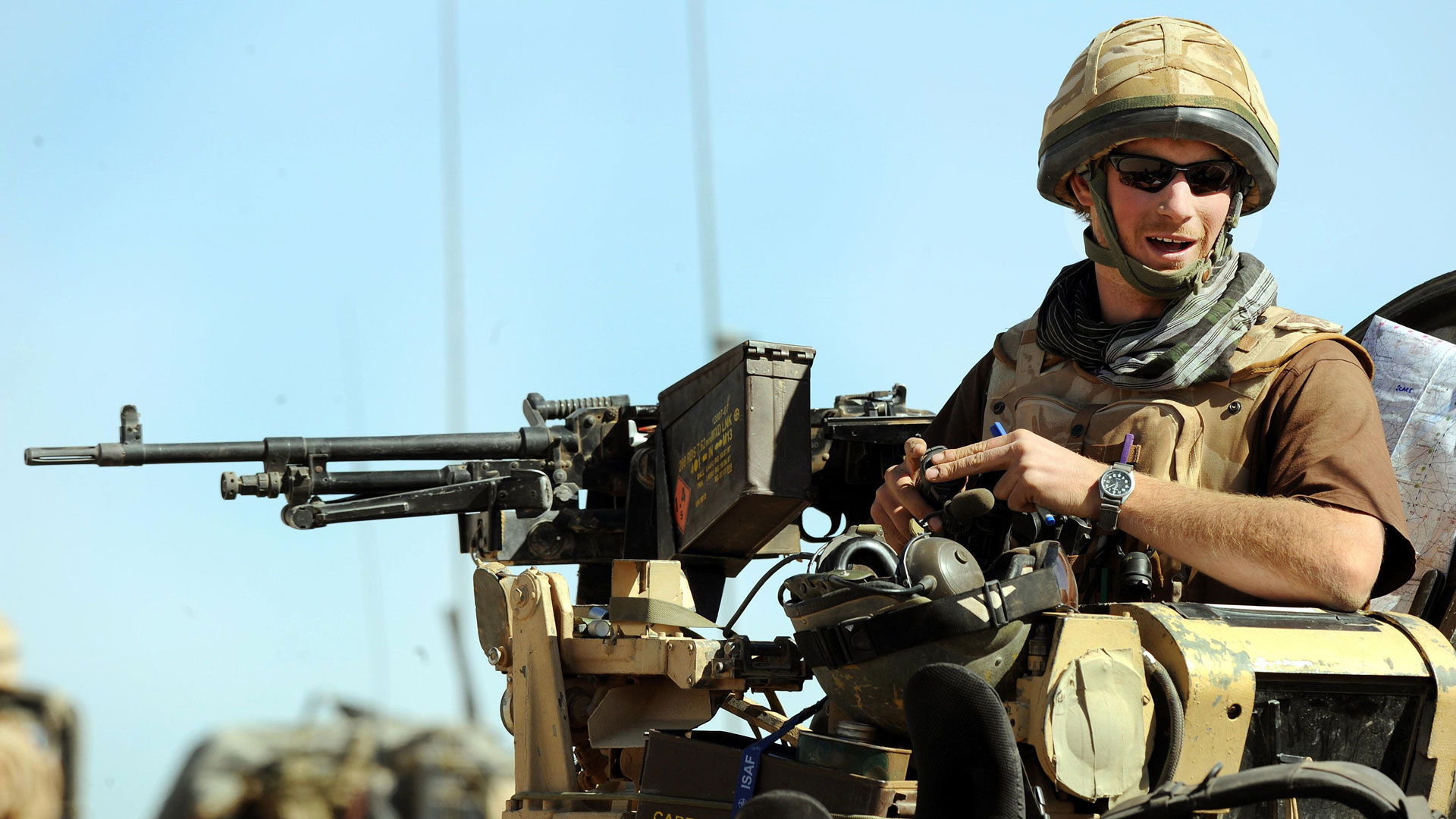 Prince Harry sitting in his position on a Spartan armoured vehicle in Helmand Province, Afghanistan (Picture: PA Images)