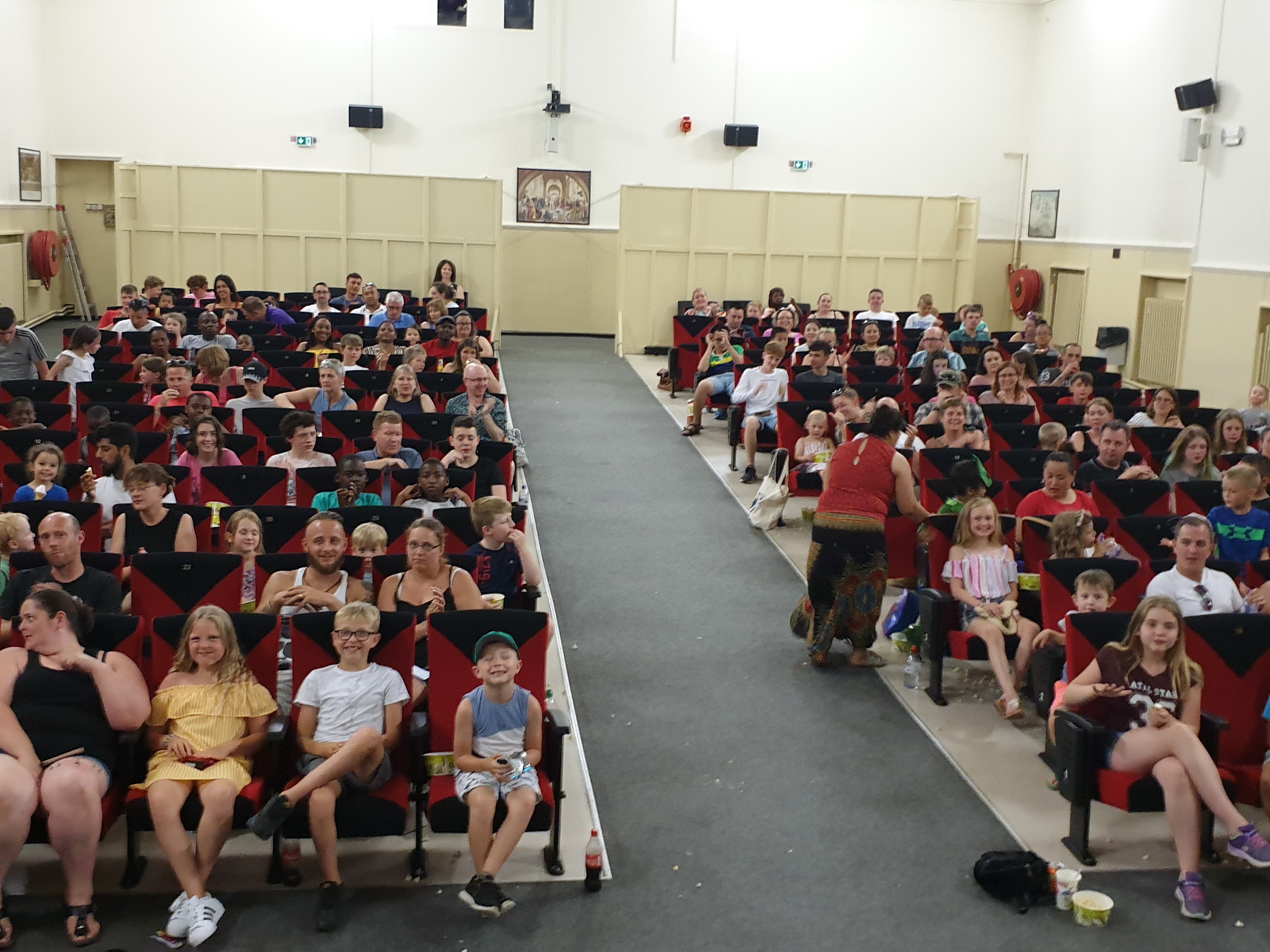 Inside the screening, waving goodbye