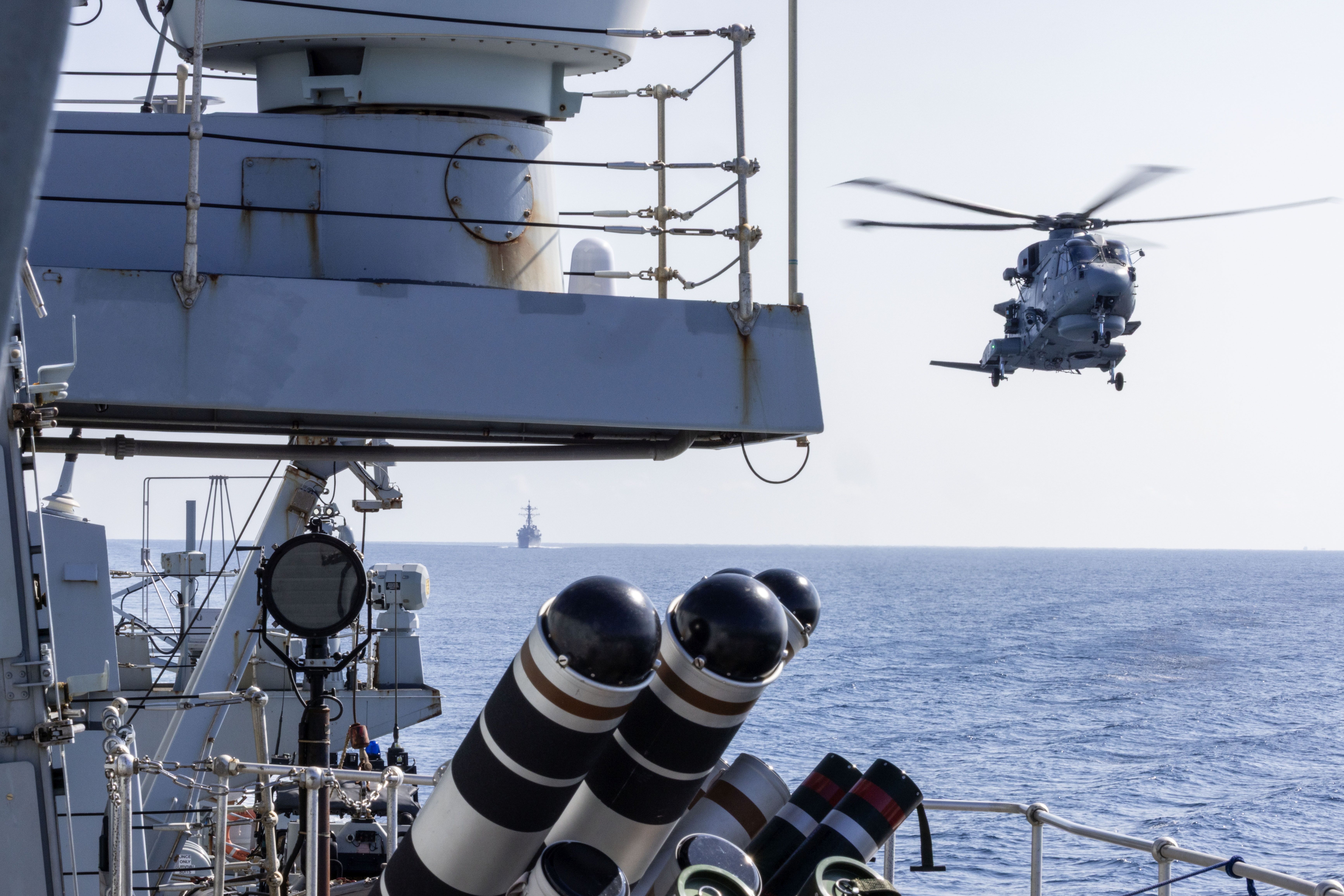 HMSRCMD with Wildcat helo and USS Higgins in Taiwan Strait