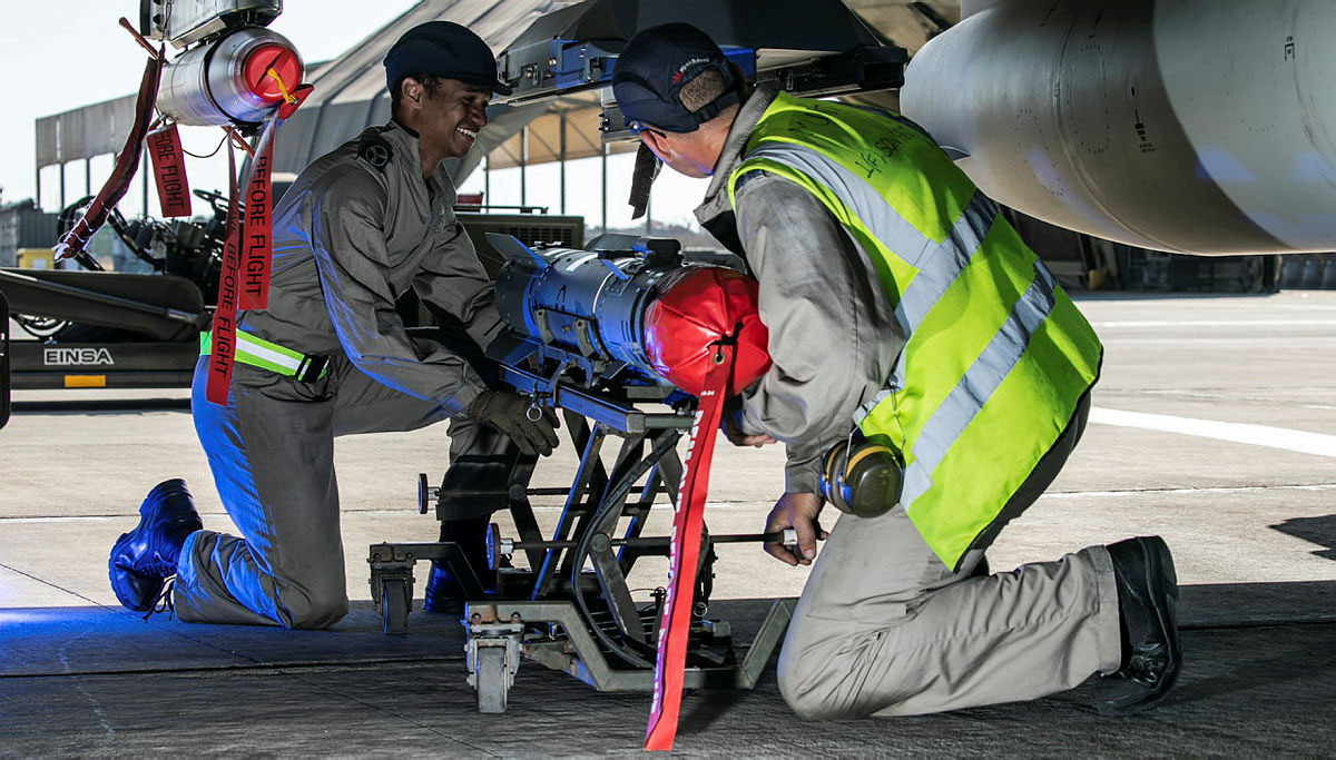 Weapons Technicians work on a Typhoon FGR.Mk 4 at RAF Akrotiri, replenishing munitions to ensure the aircraft can conduct any mission required of it