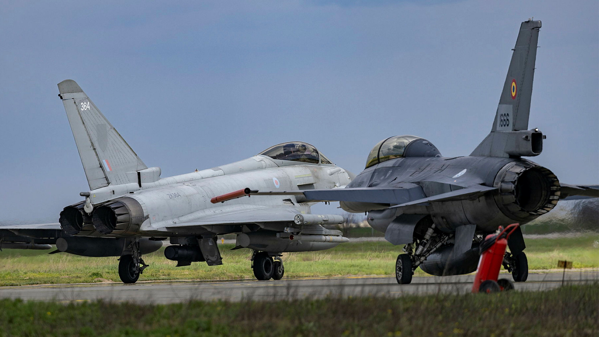 The RAF Typhoon pilots and their Romanian air force F-16 counterparts have been working together to protect Nato airspace on Operation Biloxi (Picture: MOD)