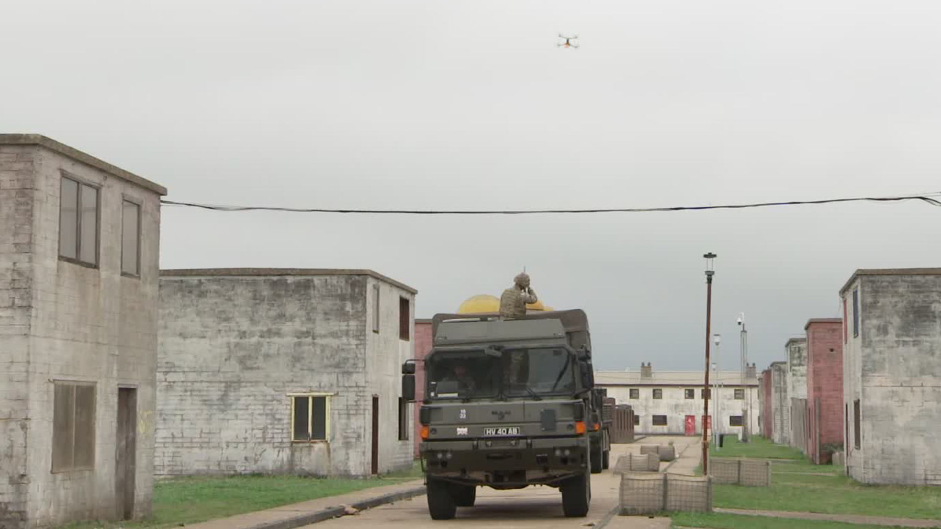 The enemy drone is hard to see in this image - and it's quite hard for the soldiers to engage - being small, light and highly agile (Picture: BFBS)