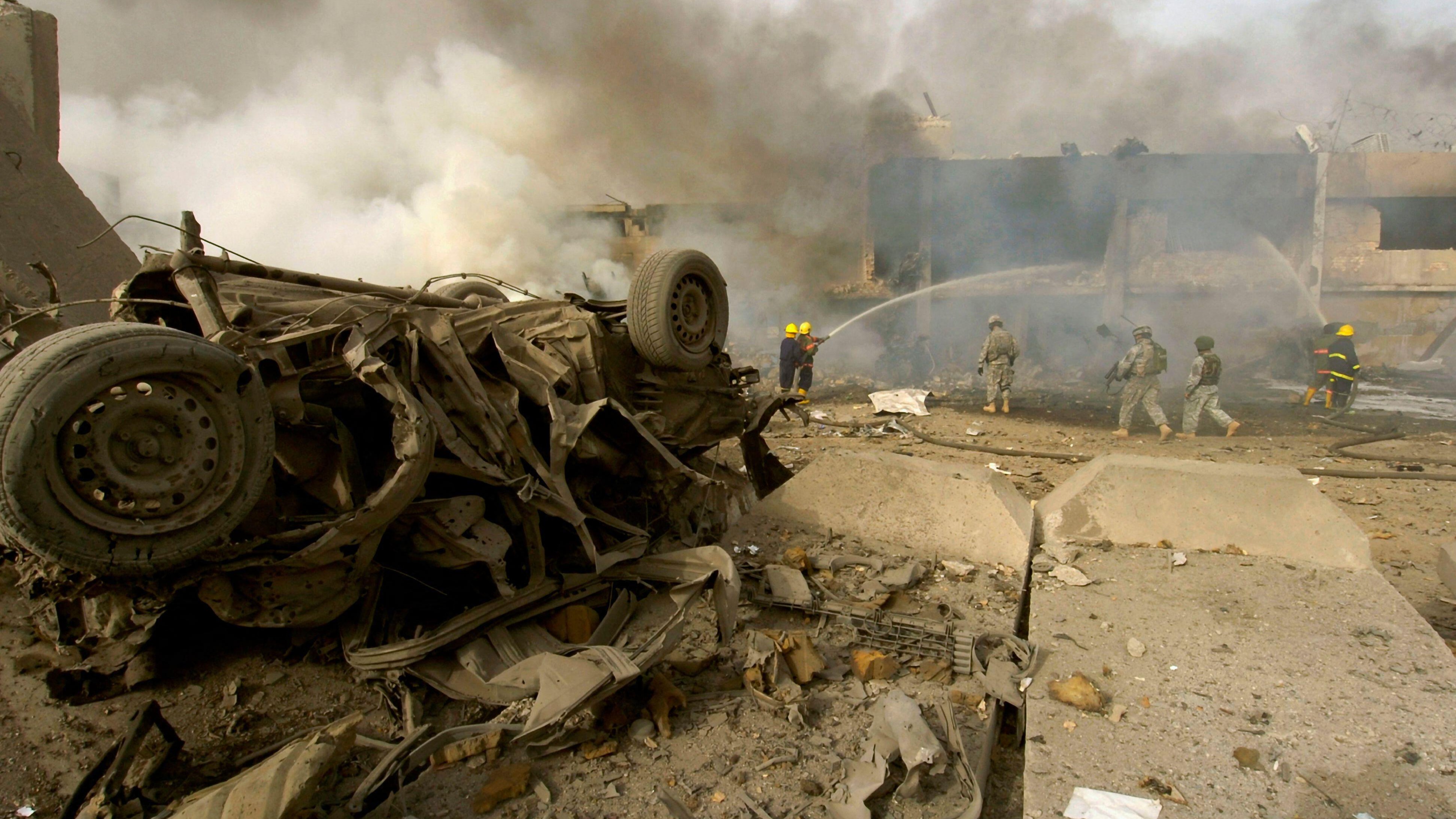 An IED explodes in the street outside the Al Sabah newspaper in Baghdad on 27 August 2006 (Picture: Alamy)