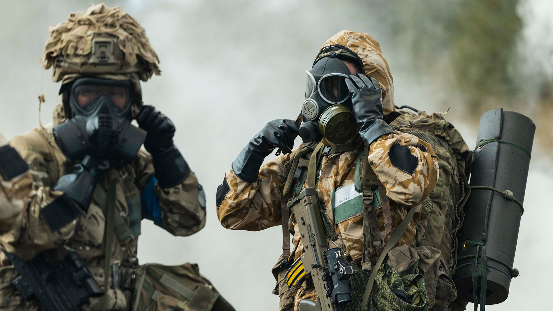 Indian troops put on their protective kit during the CBRN phase