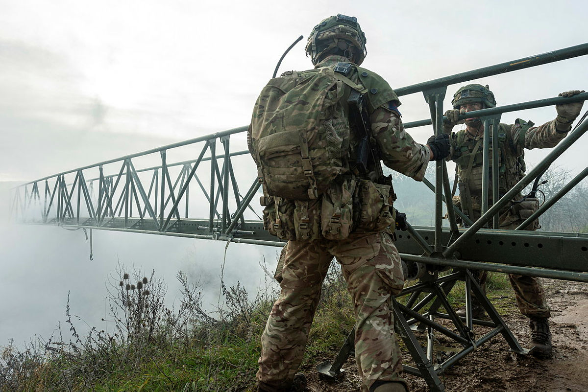 The British Army's Royal Engineers preparing an infantry foot bridge
