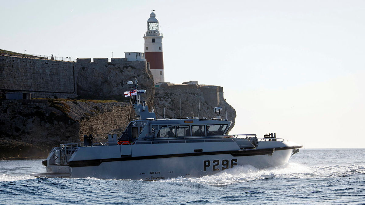HMS Dagger patrolling with Europa Point Lighthouse in the background 
