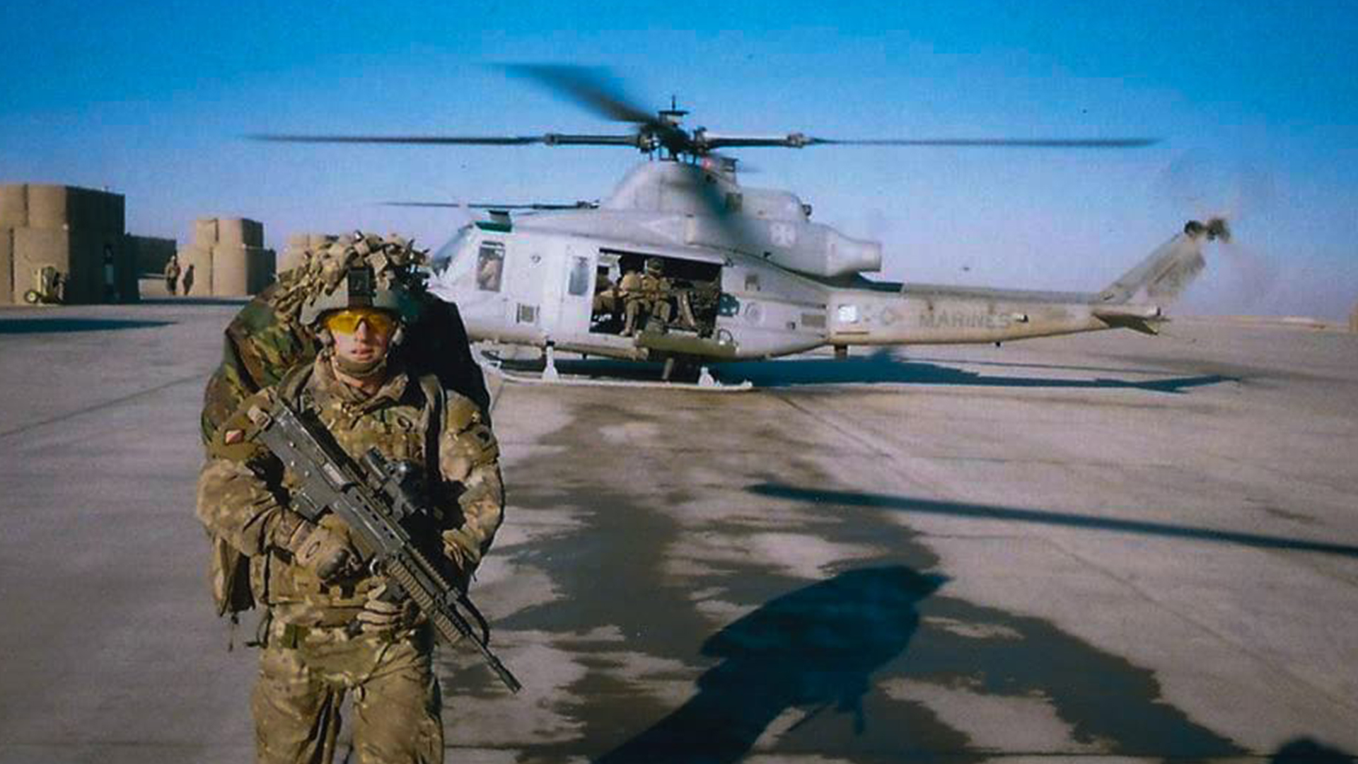 Lance Corporal Webb is seen here with a US Marine Corps Bell UH-1Y Venom - a photo his brother wishes Donald Trump could see