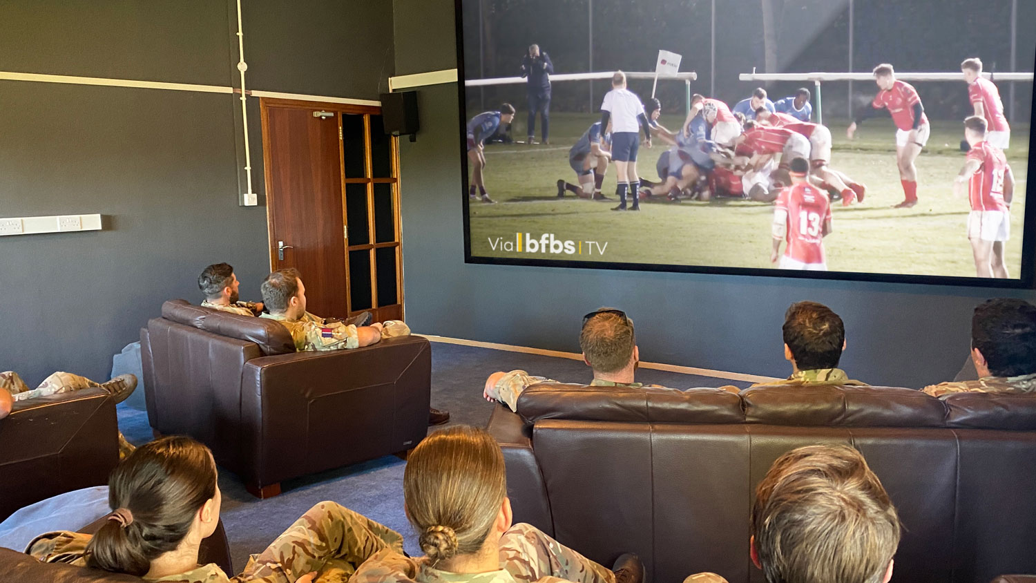 Service personnel watching BFBS TV in Cyprus