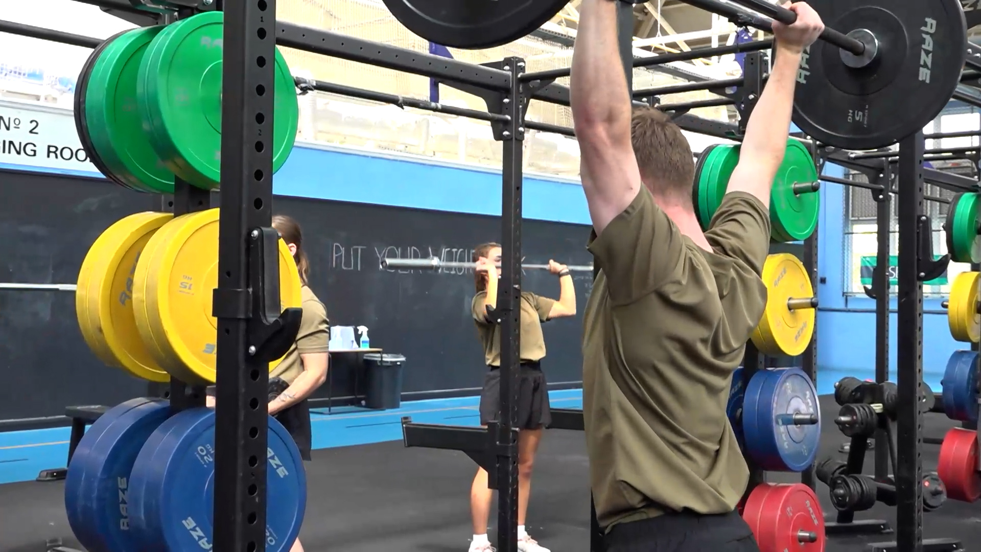 AR Harry Bell lifting weight on PTI course at RAF Cosford