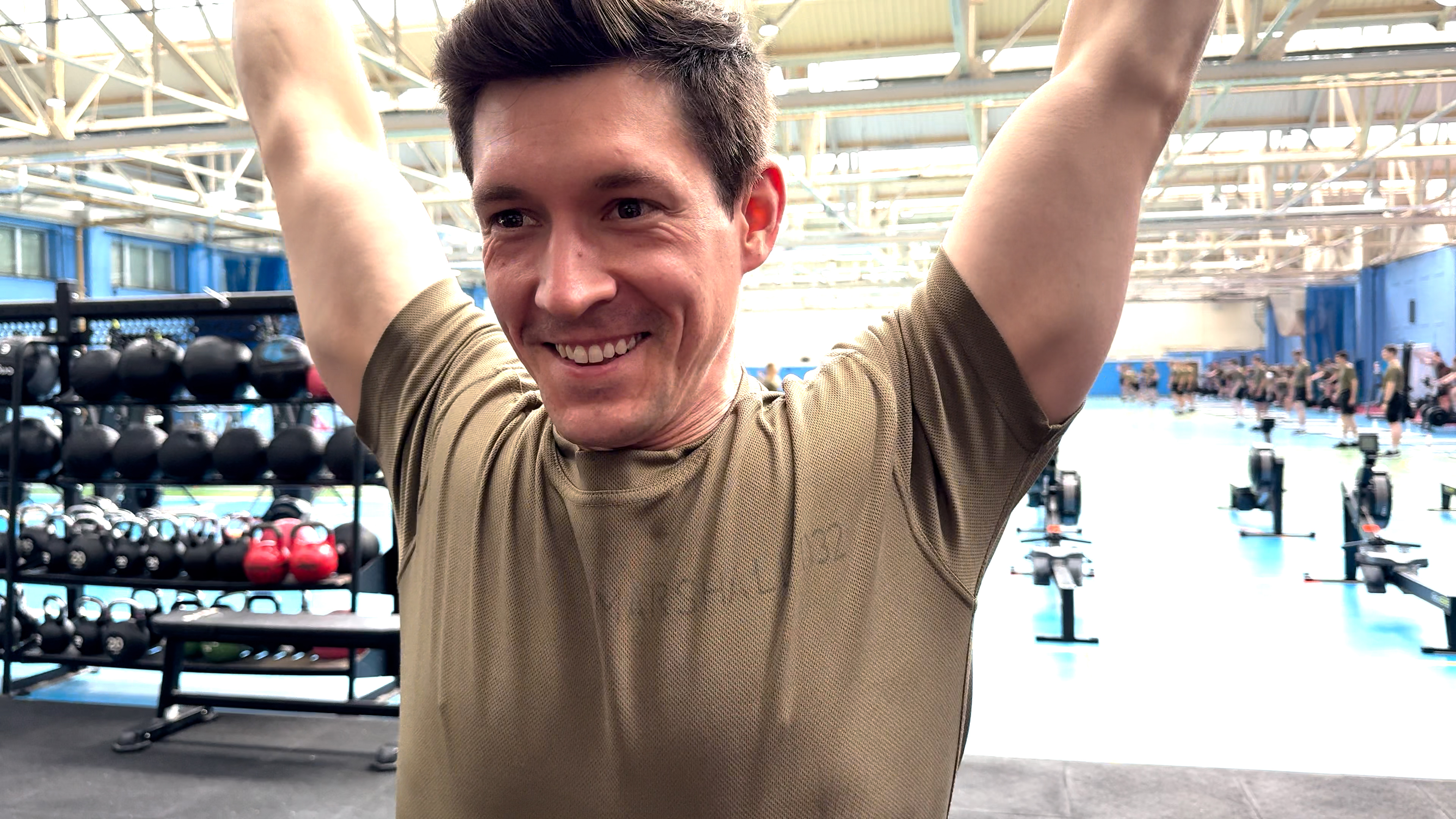 23072025 Smiling AR Colin Marshall lifting weight on PTI course at RAF Cosford CREDIT BFBS .jpg.jpg
