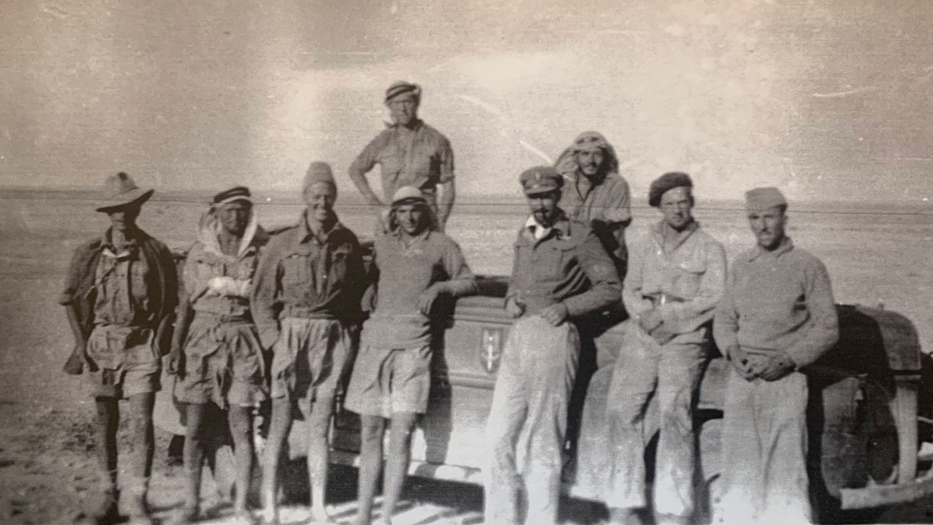 Lt Col David Stirling (front row, third from right) is pictured with his men including Gdsm Archie Gibson on the far left (Picture: Gibson family)