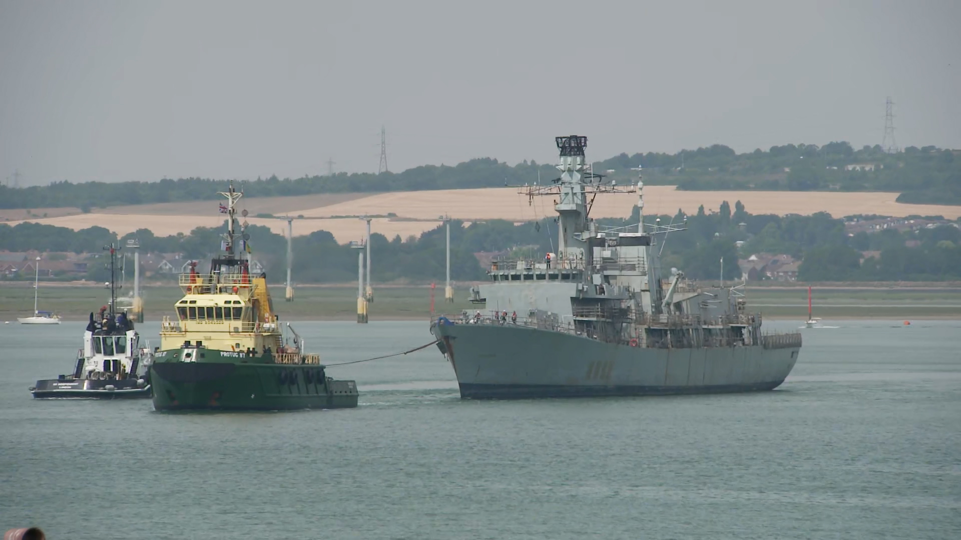 Protug 87 tows HMS Westminster away from HMNB Portsmouth for the last time (Picture: BFBS)
