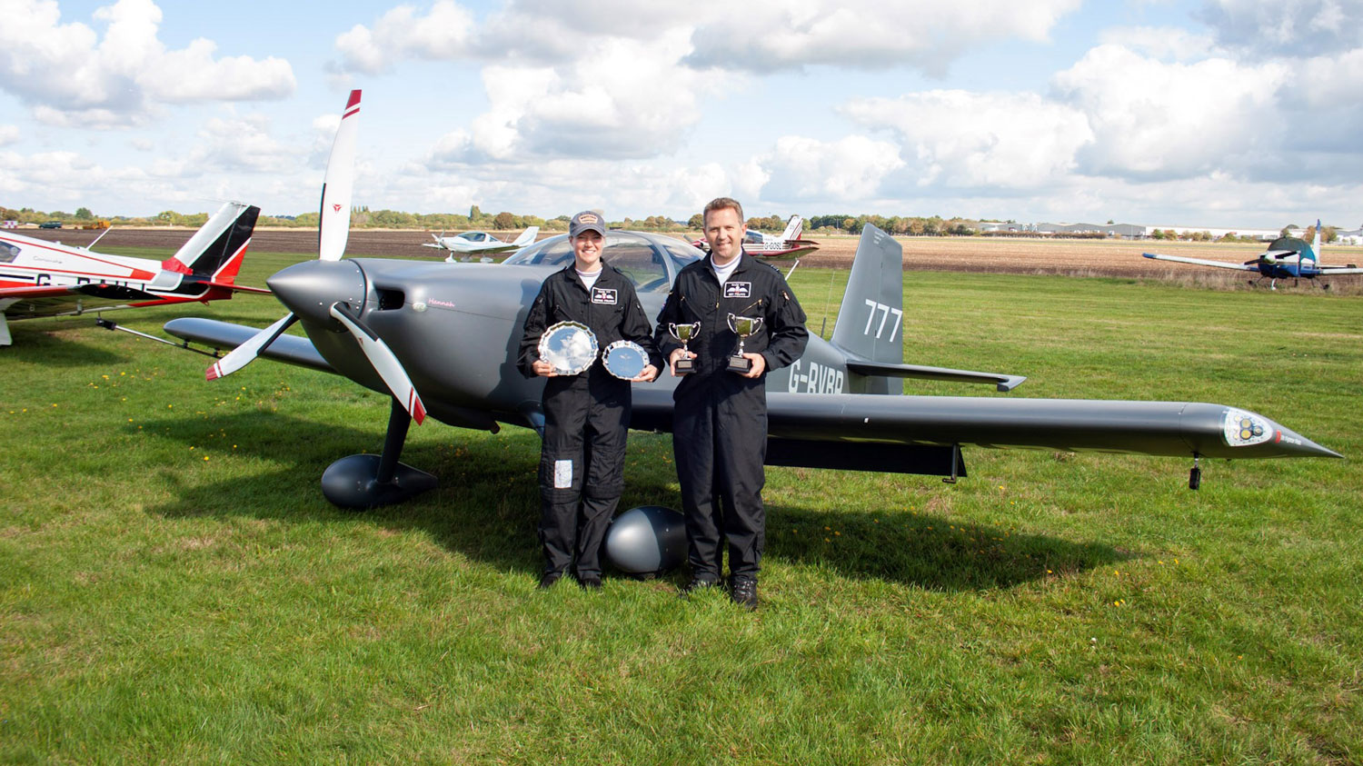 241025 Sqn Ldr Ben Polwin and his wife Sophie pictured in Wellesbourne Airfield after winning the King's Cup in September 2025 CREDIT Adam Geere