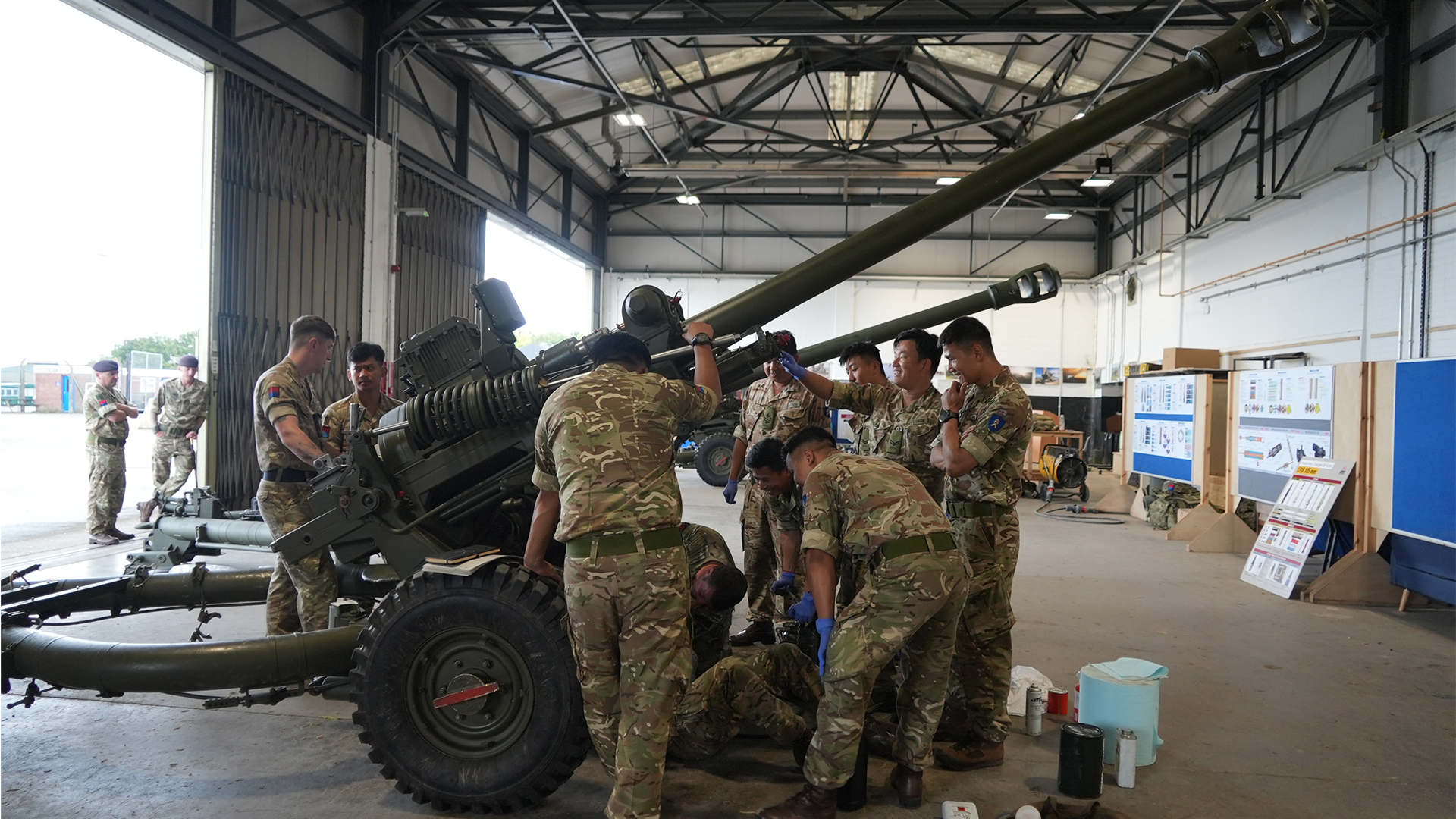 After the Second World War, Gurkhas were recruited as infanteers skilled at jungle warfare, but the role has now expanded, with these men inspecting an L118 Light Gun serving in the King's Gurkha Artillery