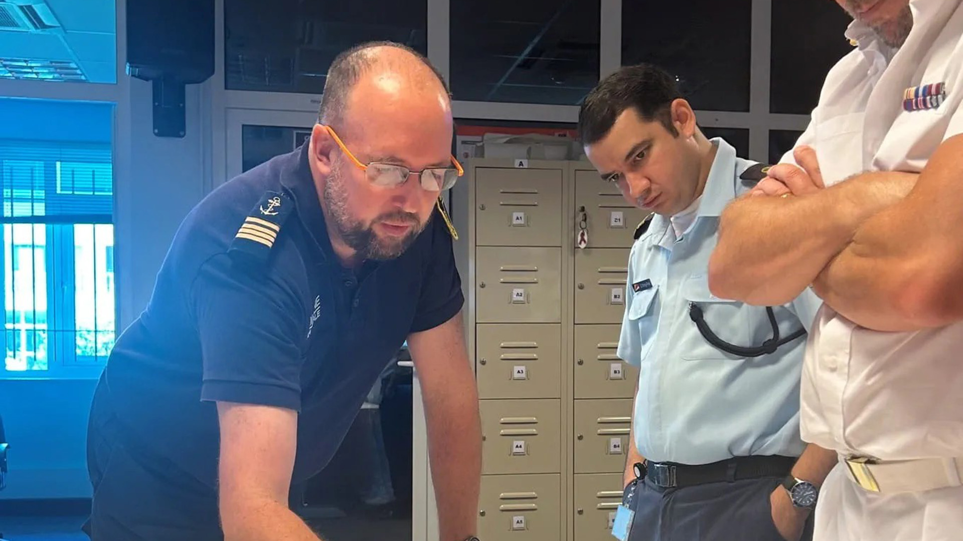 Capt Eacock discusses piracy with colleagues in the Regional Coordination of Operations Centre (Picture: Royal Navy)
