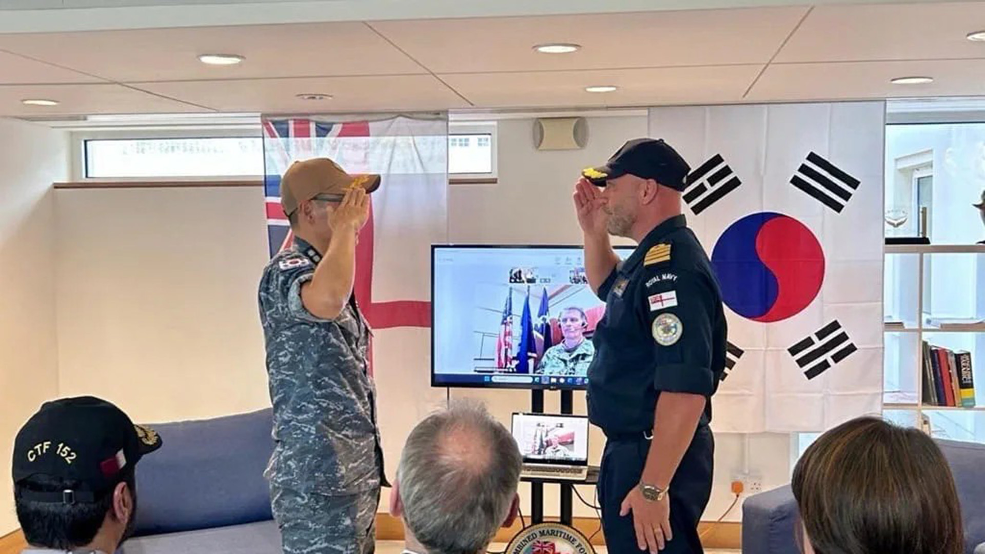 Captain Jase Eacock formally hands over command to the Republic of South Korea's Captain Yoon Hyun-woo (Picture: Royal Navy)