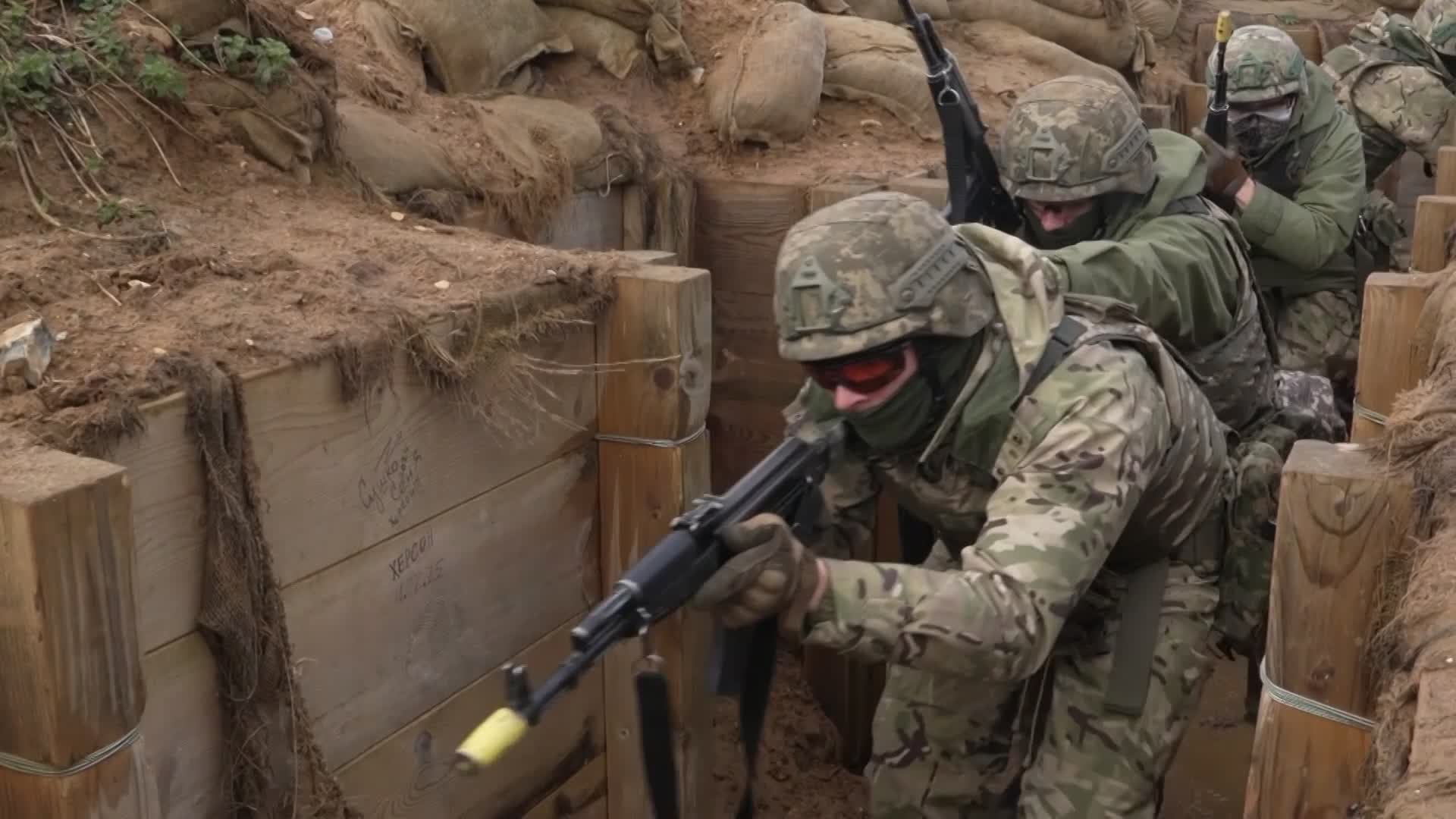 Military personnel in trenches training