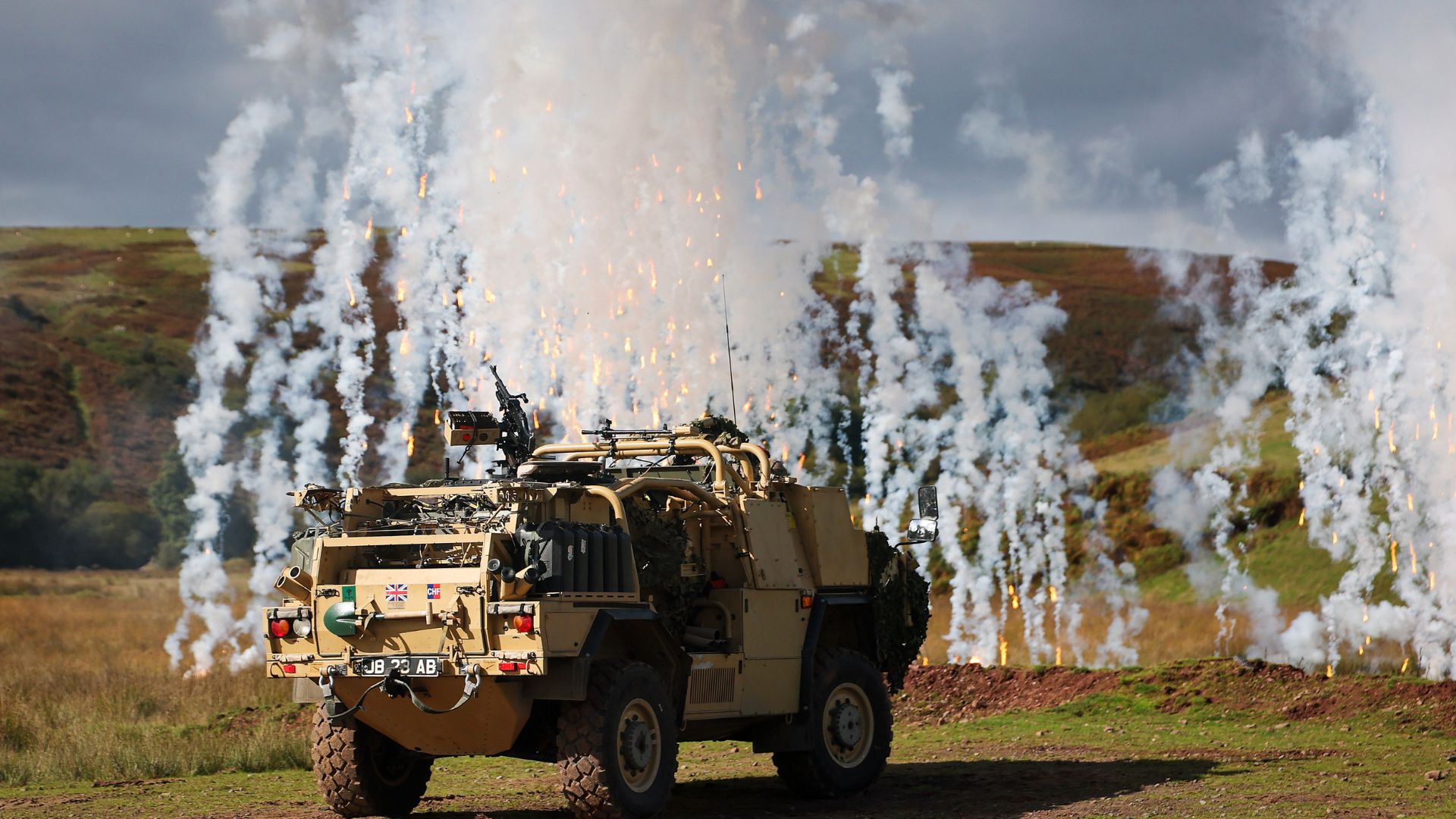 The Jackal features onboard smoke dischargers designed to rapidly deploy screening smoke to break line-of-sight (Picture: MOD)