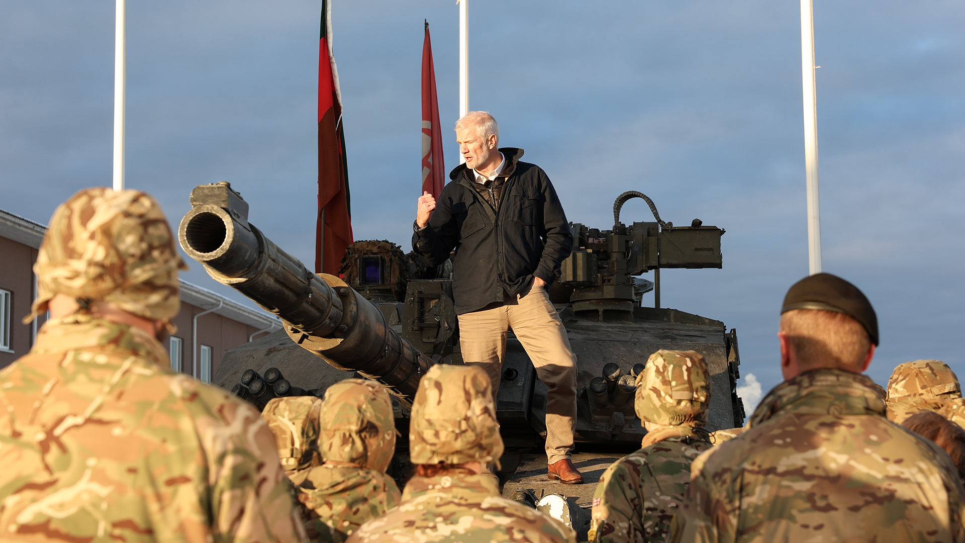 The former Royal Marines colonel, seen here talking to troops on Op Cabrit, is no stranger to conflict, having served five tours in Afghanistan