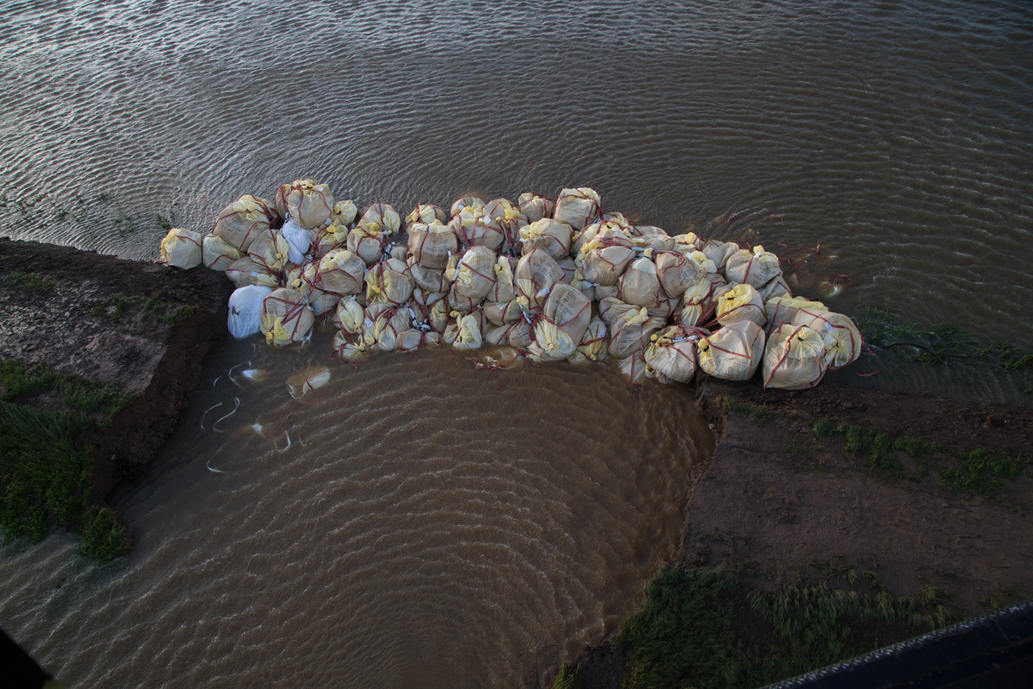 270 tonnes of gravel was dropped by the RAF to stem the flow of the water (Picture: MOD).