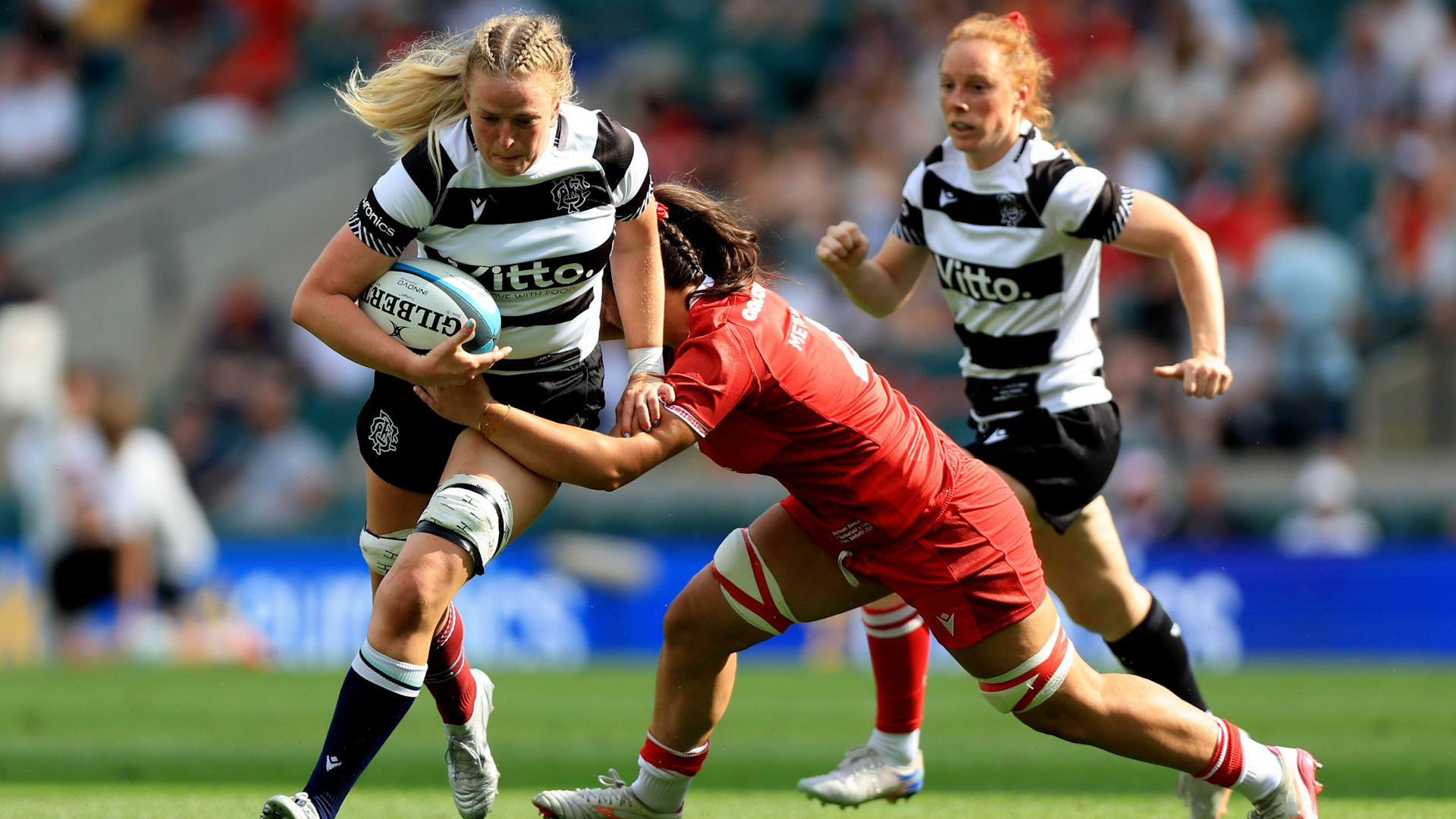 27062026 Barbarians' Sarah Bonar (left) is tackled by Wales' Branwen Metcalfe during a women's international test match at Allianz Stadium, Twickenham CREDIT PA Images.jpg