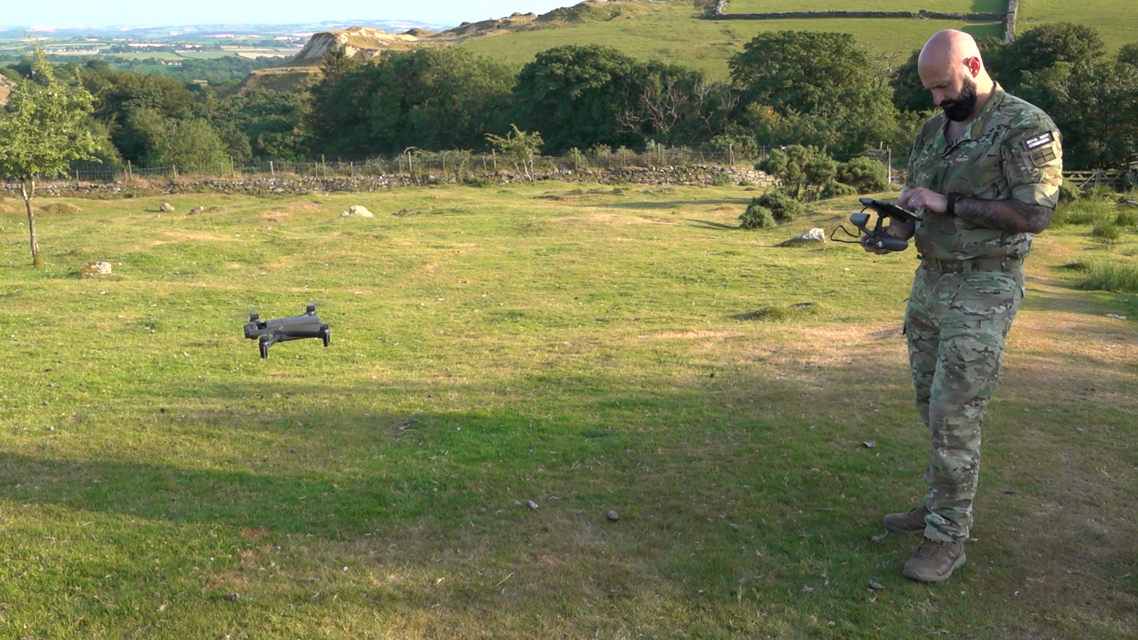 DSTO instructor Petty Officer Anthony Pyke uses a drone  to search for students on the evade section of the course - just like the enemy would do in a real war scenario (Picture: BFBS)