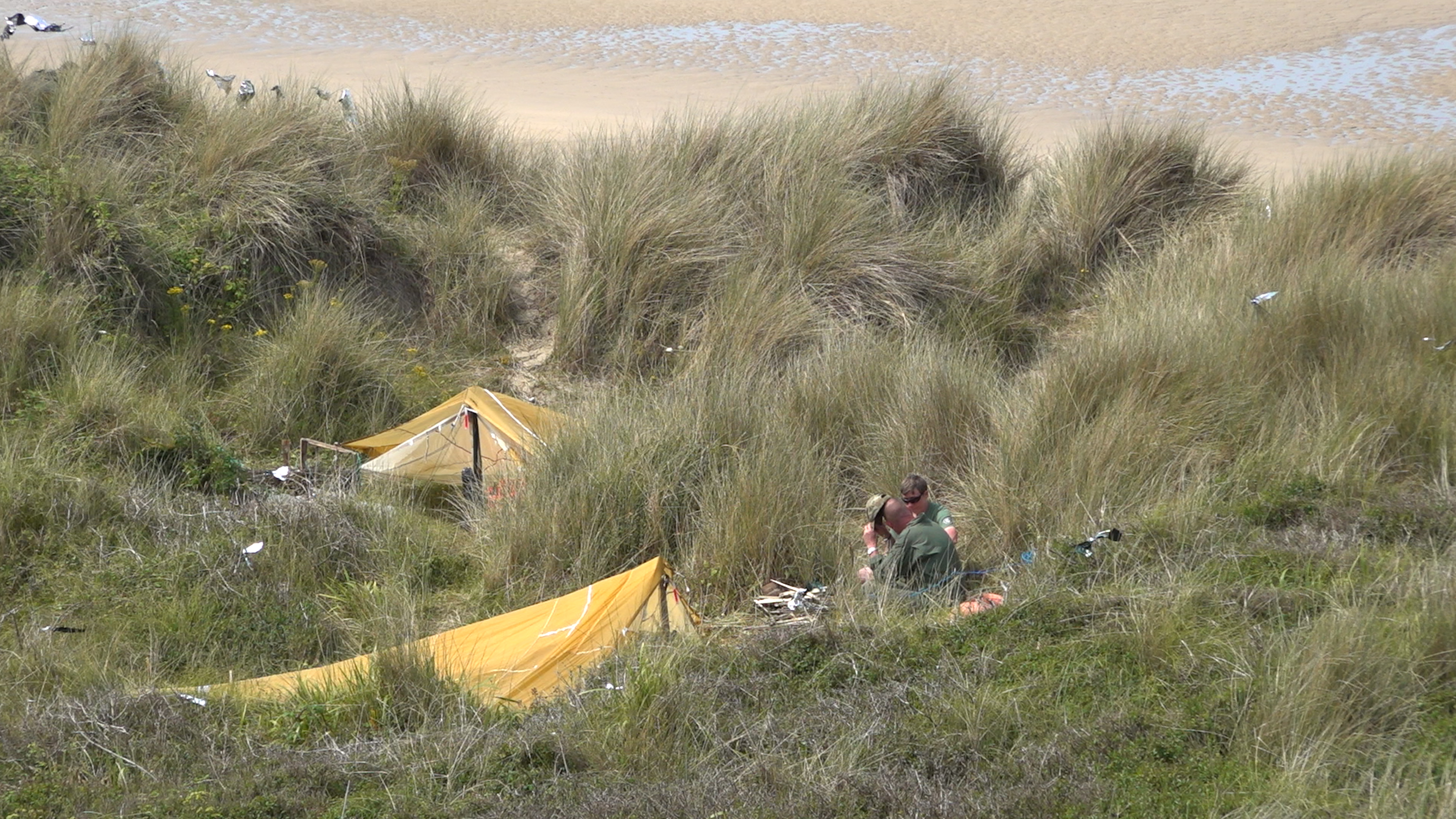 Students are taught how to make survival shelters out of their kit (Picture: BFBS)