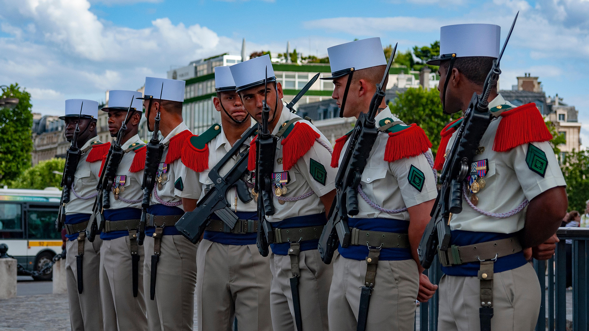 These legionnaires, armed with the now-outdated Famas bullpup assault rifle, parade in their world-famous kepi blanc (Picture: Alamy)
