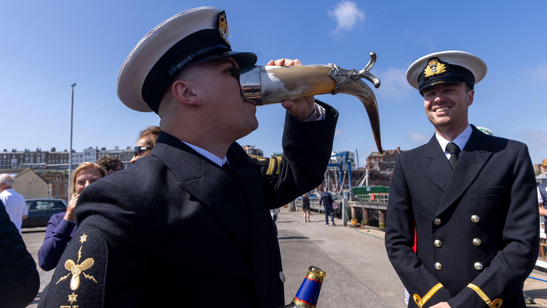 A sailor enjoys a measure of Pussers Rum - something that's going to be more of a rarity in future