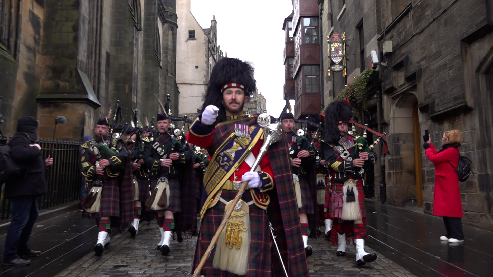 The pipes and drums leading the parade down the Royal Mile in Edinburgh