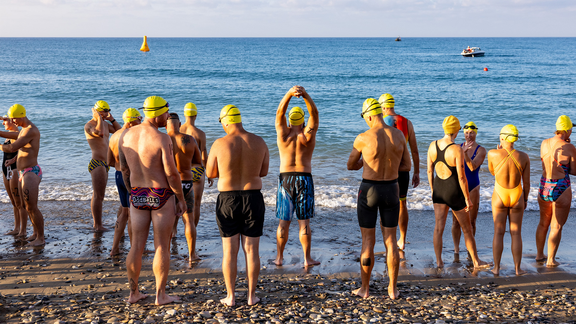 Swimmers warm up for the race