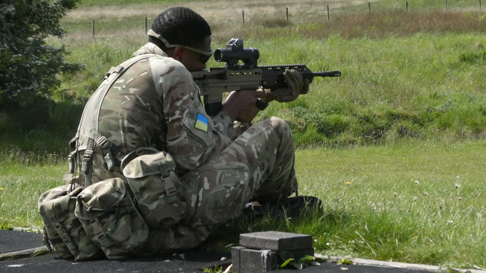 The range session saw the soldiers adopt a number of shooting stances, including sitting - opportunities to shoot 5.56x45mm weapons are limited in Bermuda (Picture: BFBS)