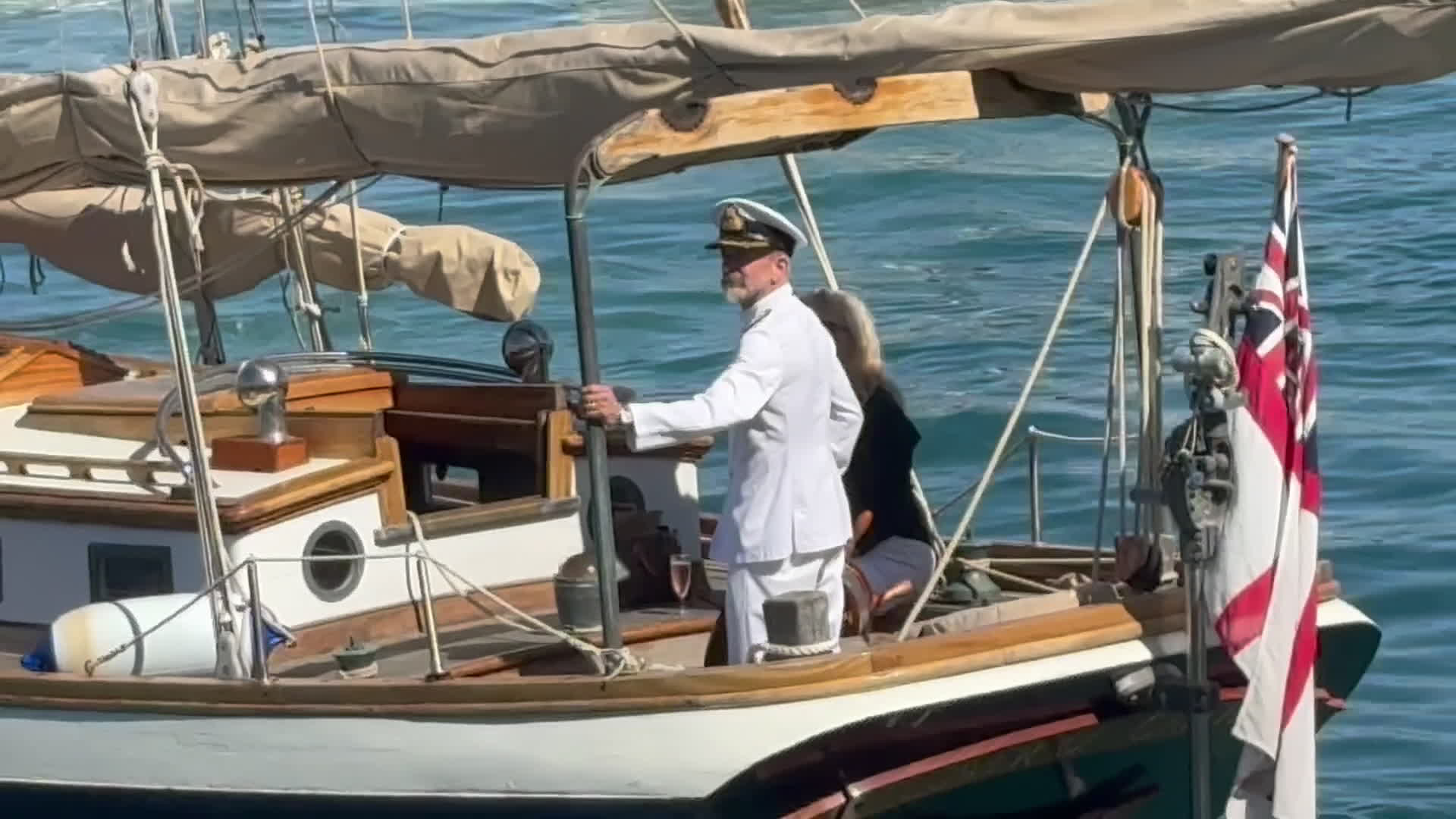Commodore Tom Guy and his wife Katie leave the base with an escort from the Royal Navy Gibraltar Squadron after four years in the role (Picture: BFBS)