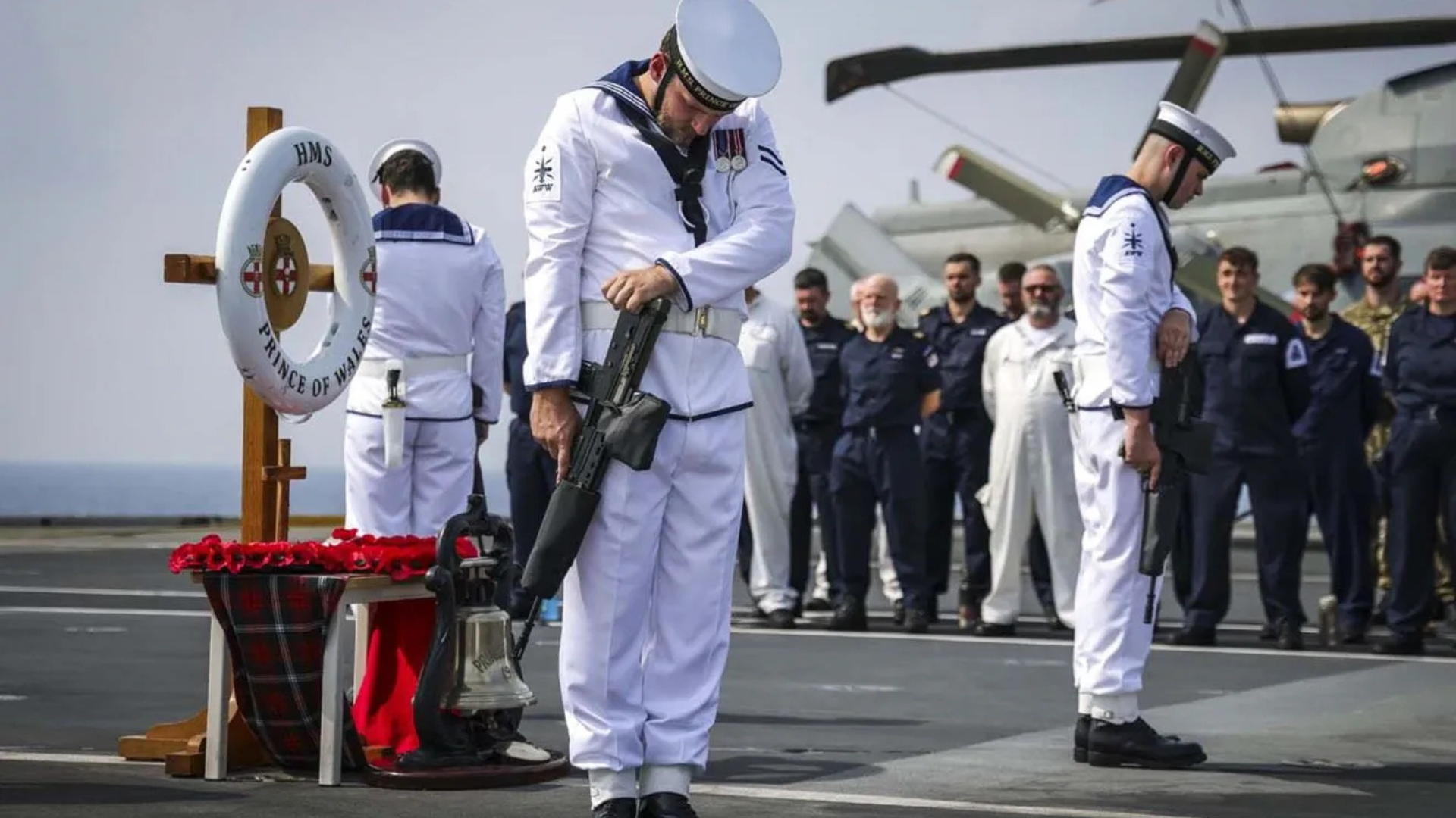 Sailors aboard HMS Prince of Wales held a Remembrance Service and Committal of Wreaths 