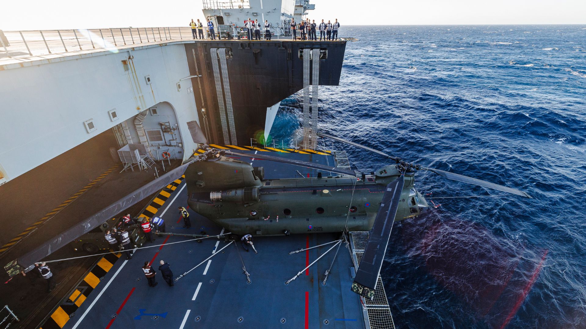 RAF and Royal Navy crews must work quickly to protect the aircraft from the elements (Picture: MOD)