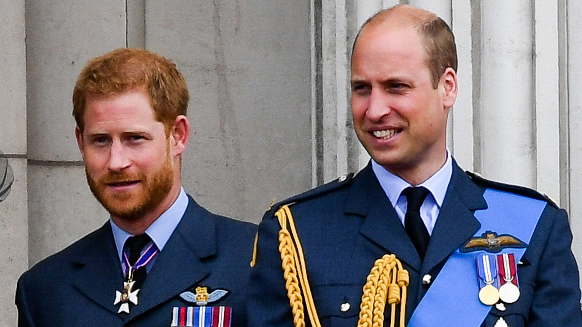 2GXBTM5 Prince Harry and Prince William stand on the balcony of Buckingham Palace in London to watch the flypast to mark the centenary of the RAF 100718 CREDIT Anwar Hussein Alamy 110823