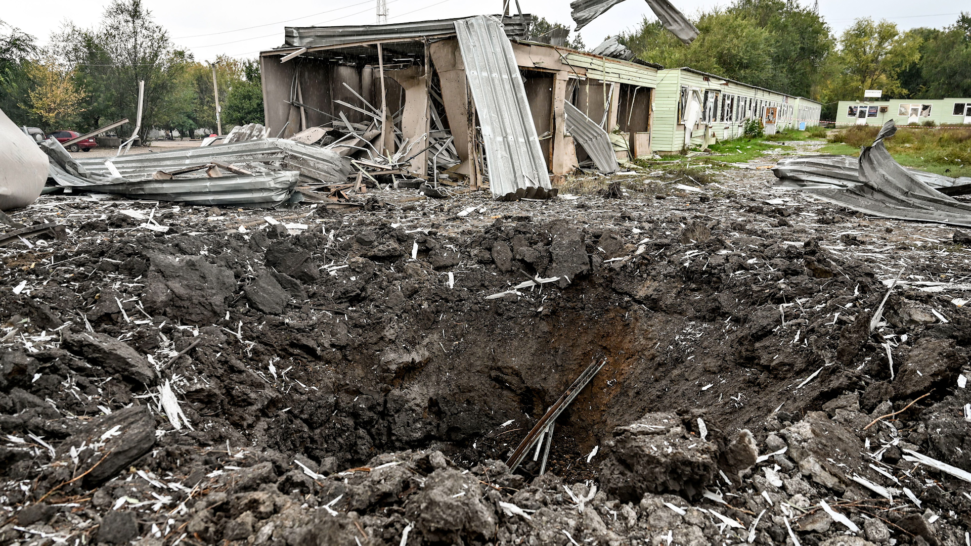The crater from a Russian rocket is pictured at the scene of a deadly Russian missile strike on a humanitarian convoy in Zaporizhzhia, southeastern Ukraine (Picture: Ukrinform/Alamy Stock Photo).